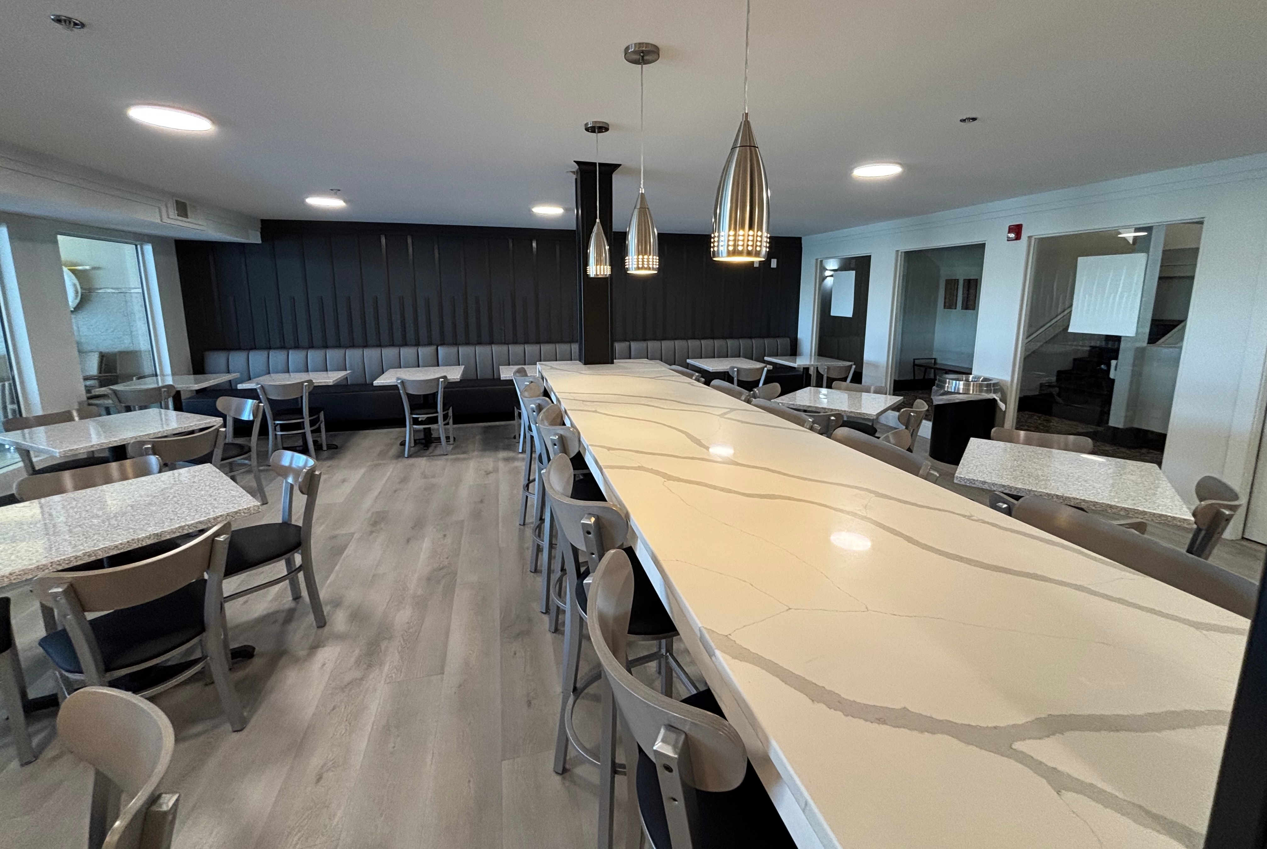 Ramada by Wyndham Springfield North restaurant breakfast area with seating in Springfield, Illinois