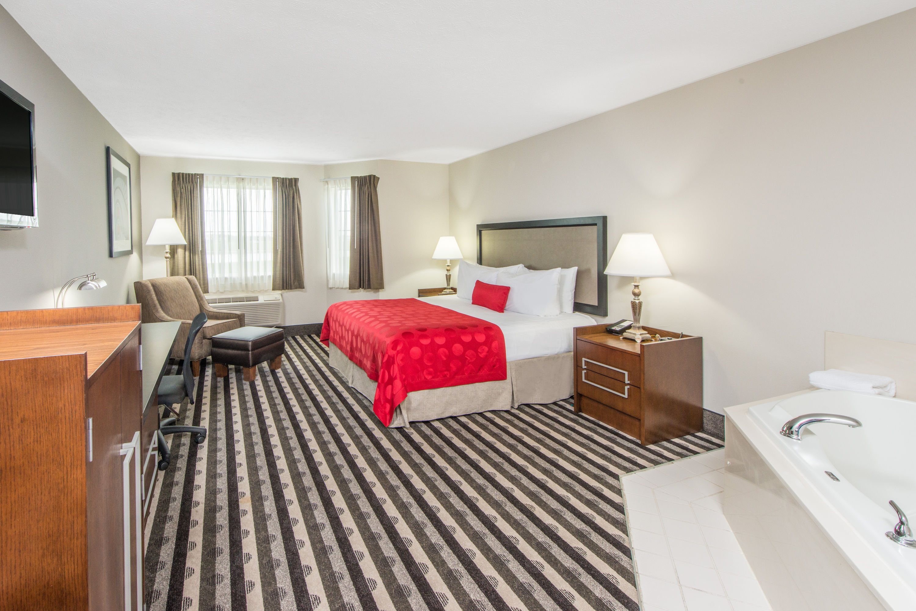 Guest room at the Ramada by Wyndham Springfield North in Springfield, Illinois