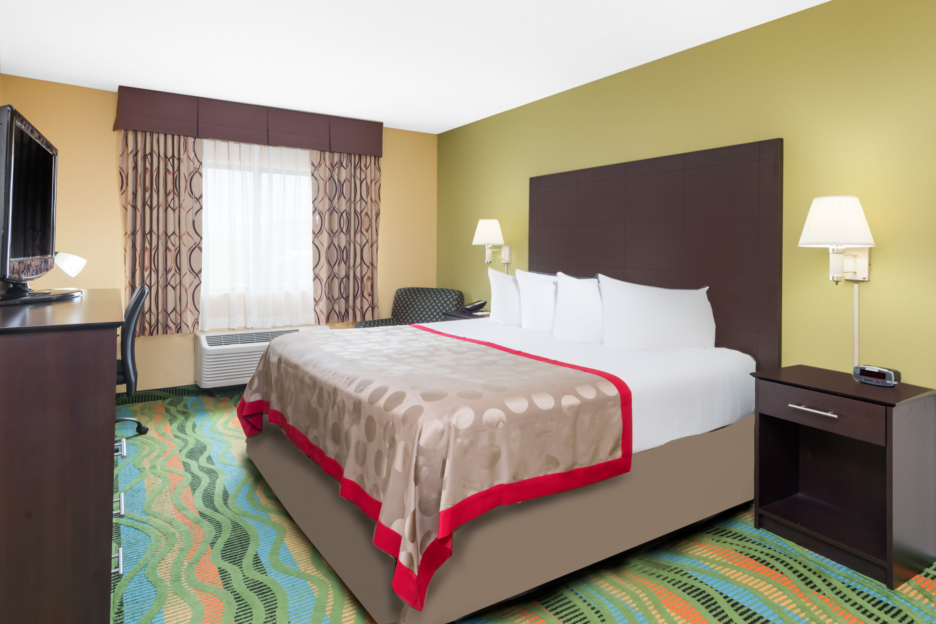 Guest room at the Ramada by Wyndham Vandalia in Vandalia, Illinois