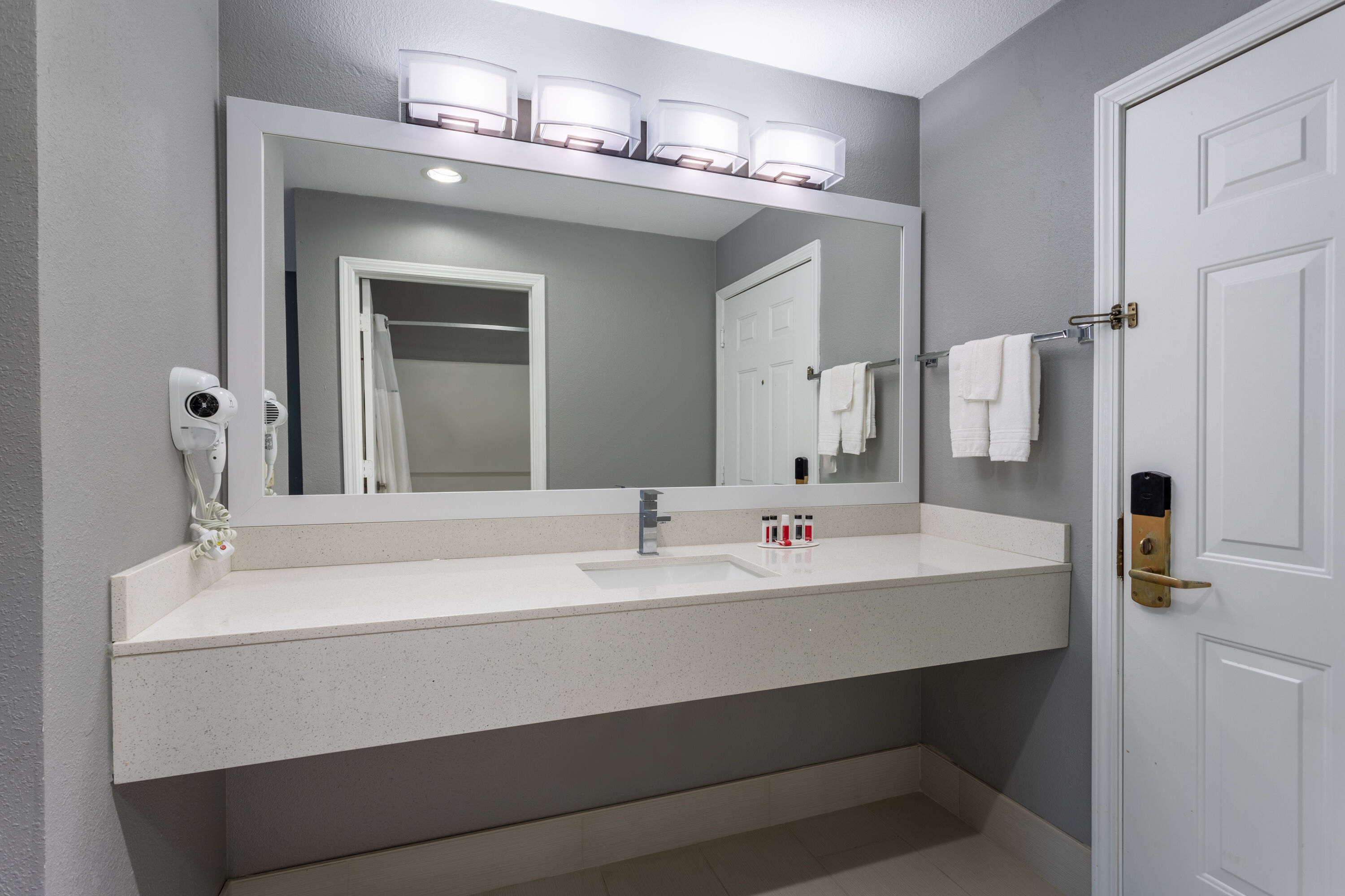 Guest room bath at the Ramada by Wyndham Sellersburg/Louisville North in Sellersburg, Indiana