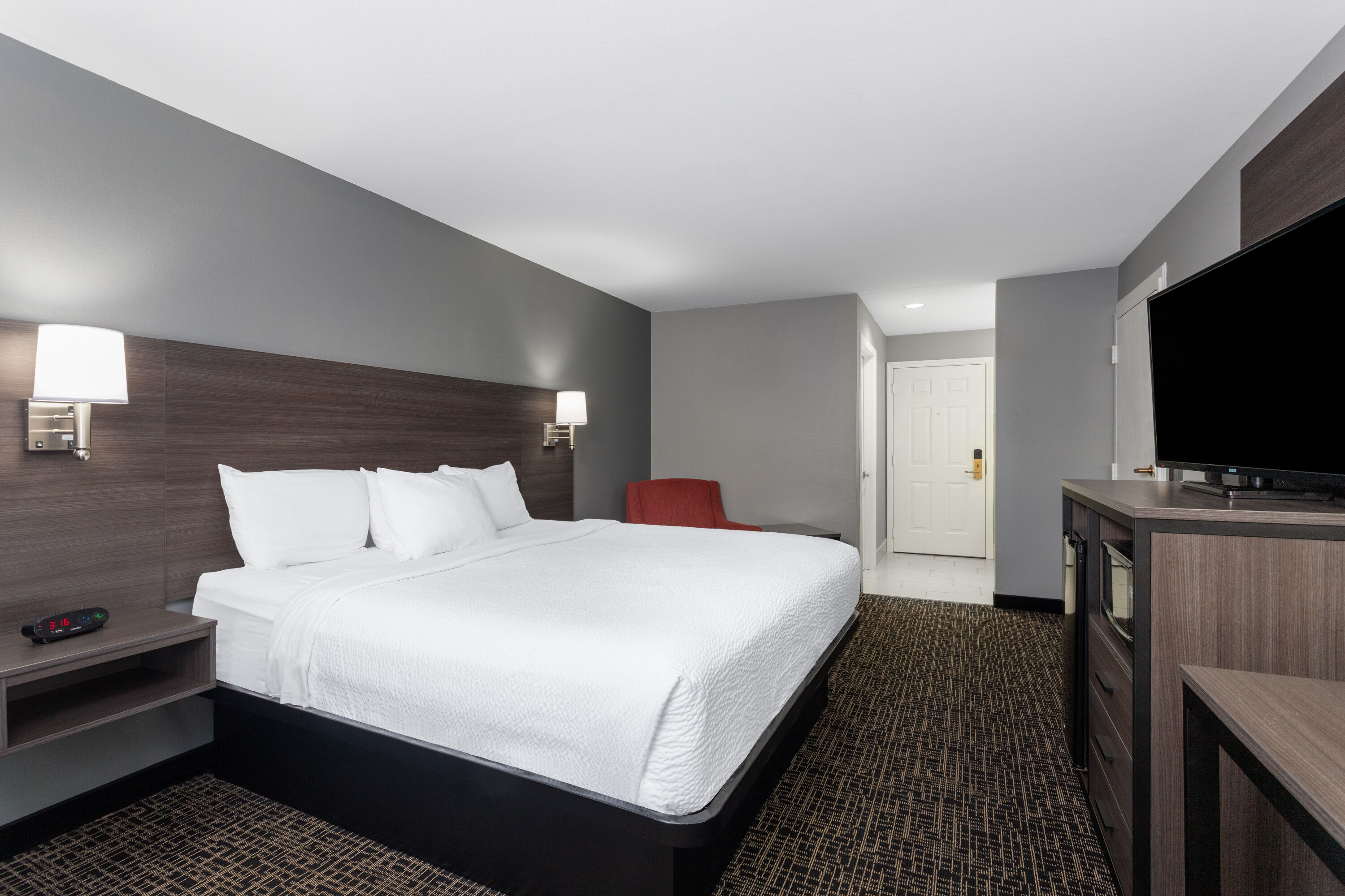 Guest room at the Ramada by Wyndham Sellersburg/Louisville North in Sellersburg, Indiana