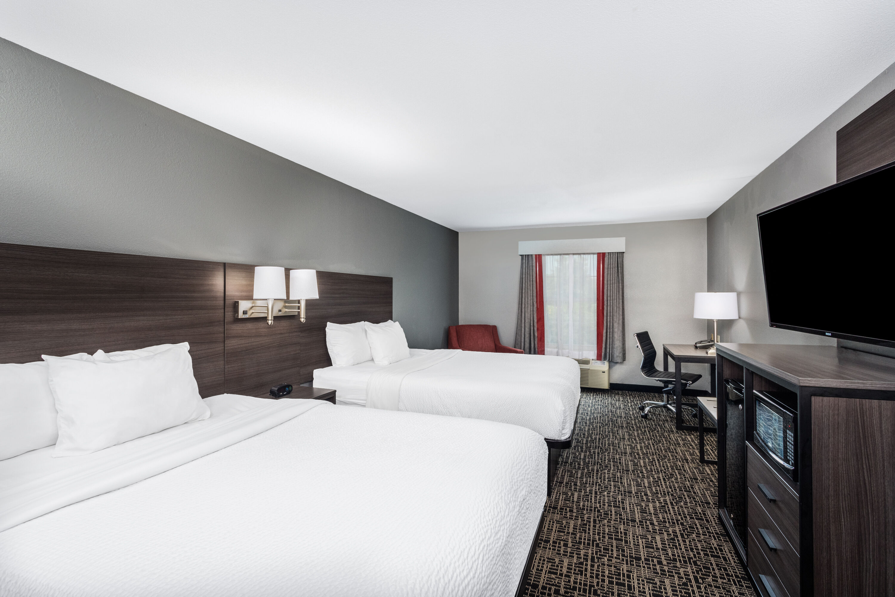 Guest room at the Ramada by Wyndham Sellersburg/Louisville North in Sellersburg, Indiana