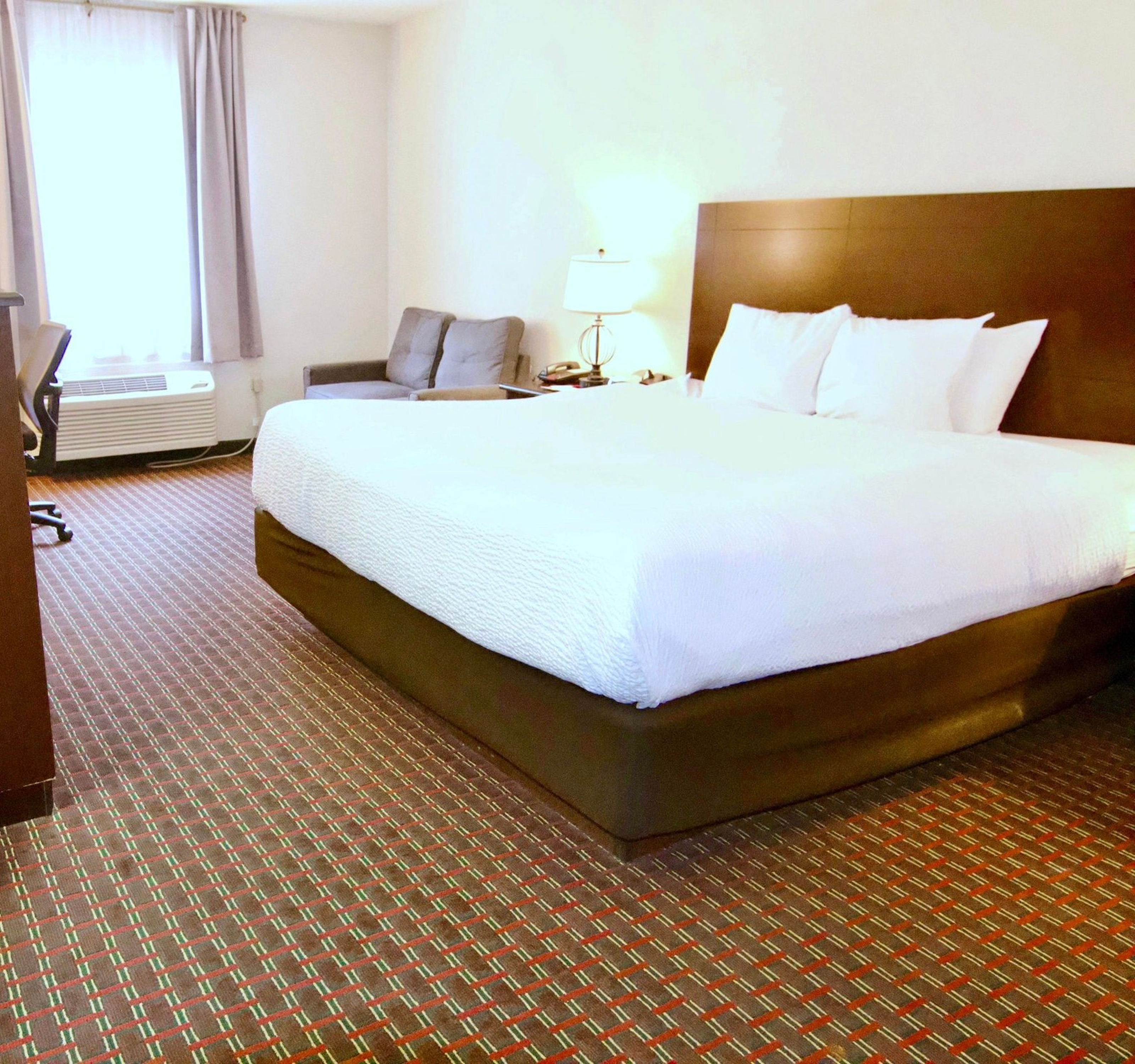 Guest room at the Ramada by Wyndham Tell City in Tell City, Indiana
