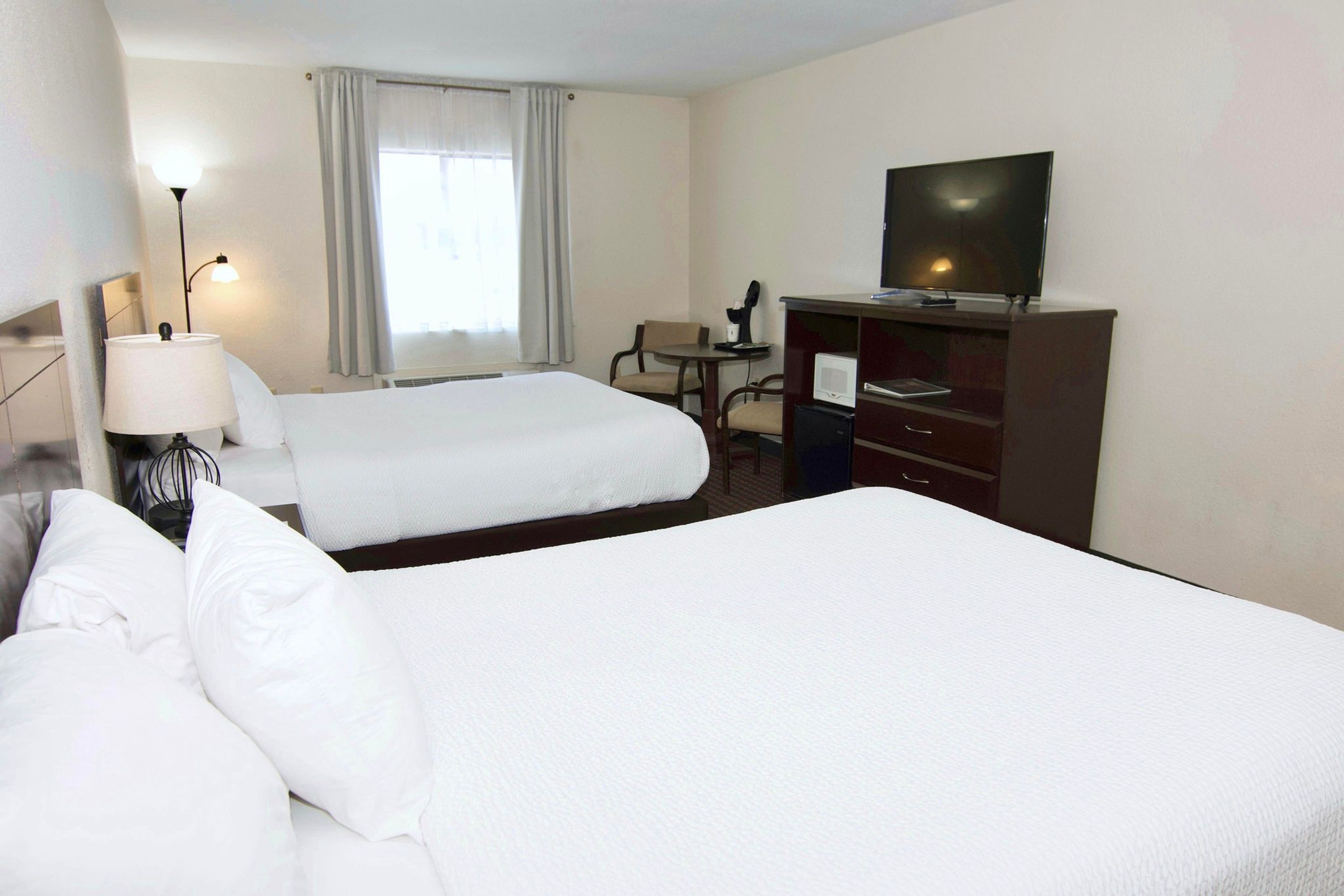 Guest room at the Ramada by Wyndham Tell City in Tell City, Indiana