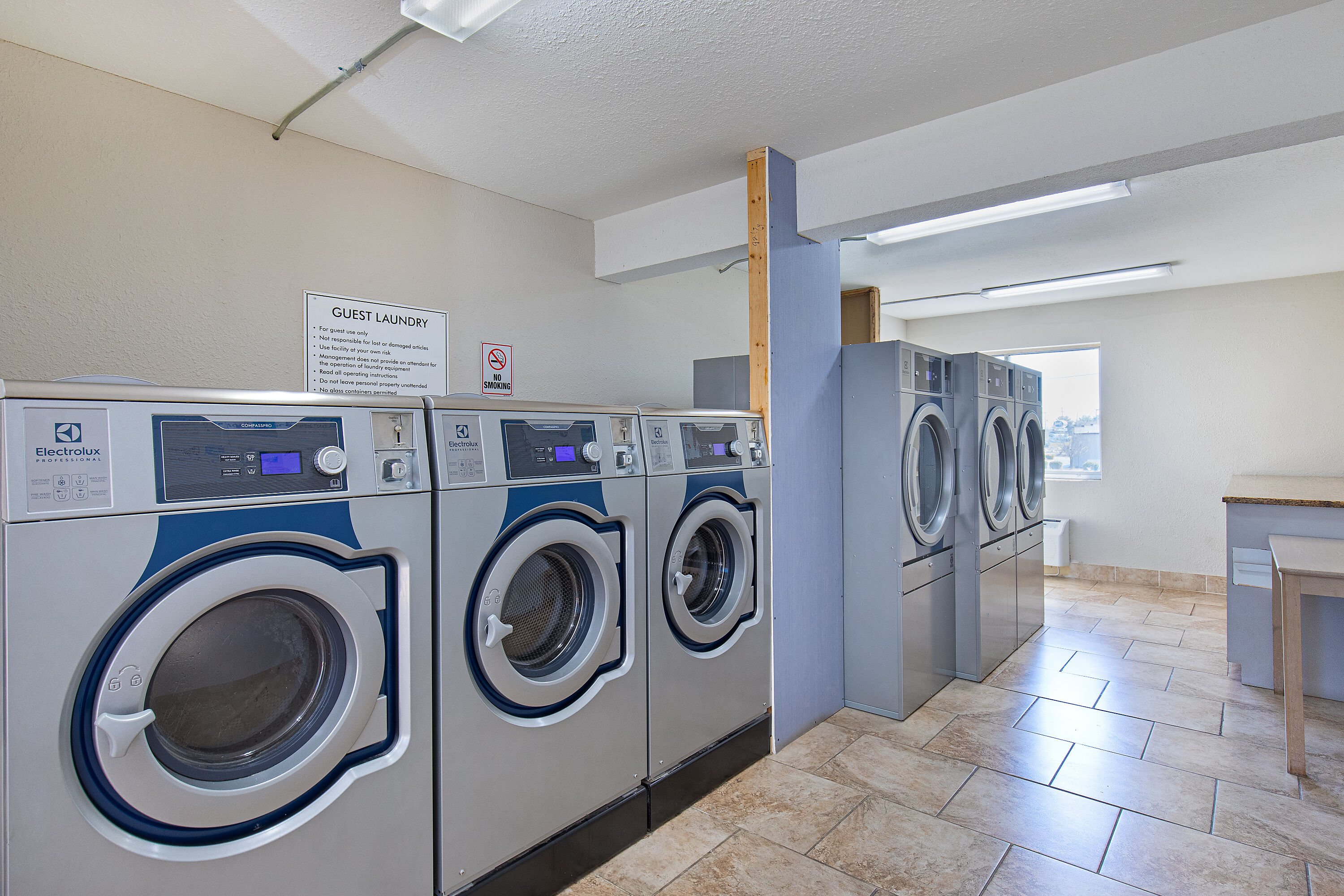Laundry facilities at Ramada by Wyndham Bowling Green in Bowling Green, Kentucky
