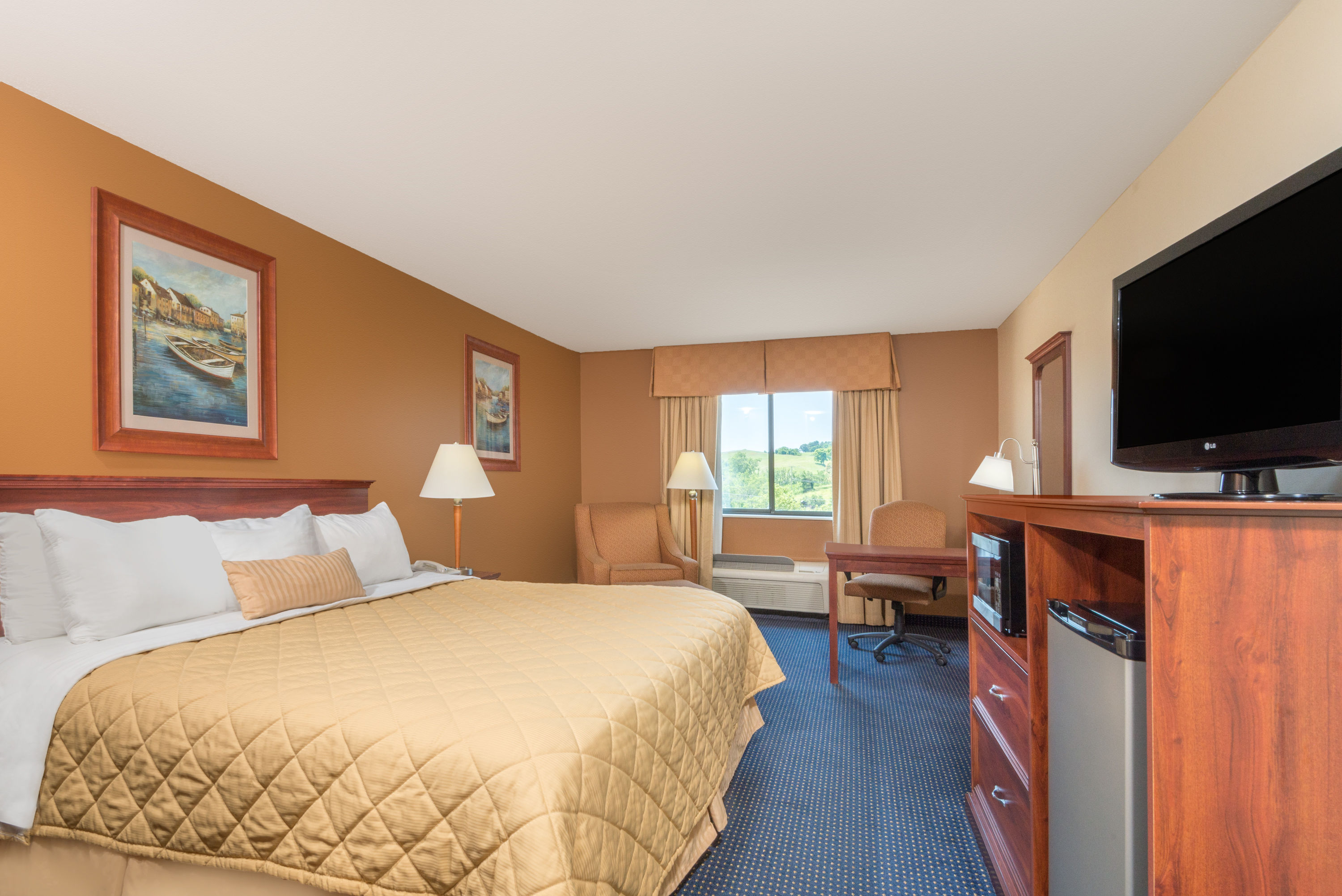 Guest room at the Ramada by Wyndham Catlettsburg/Ashland in Catlettsburg, Kentucky