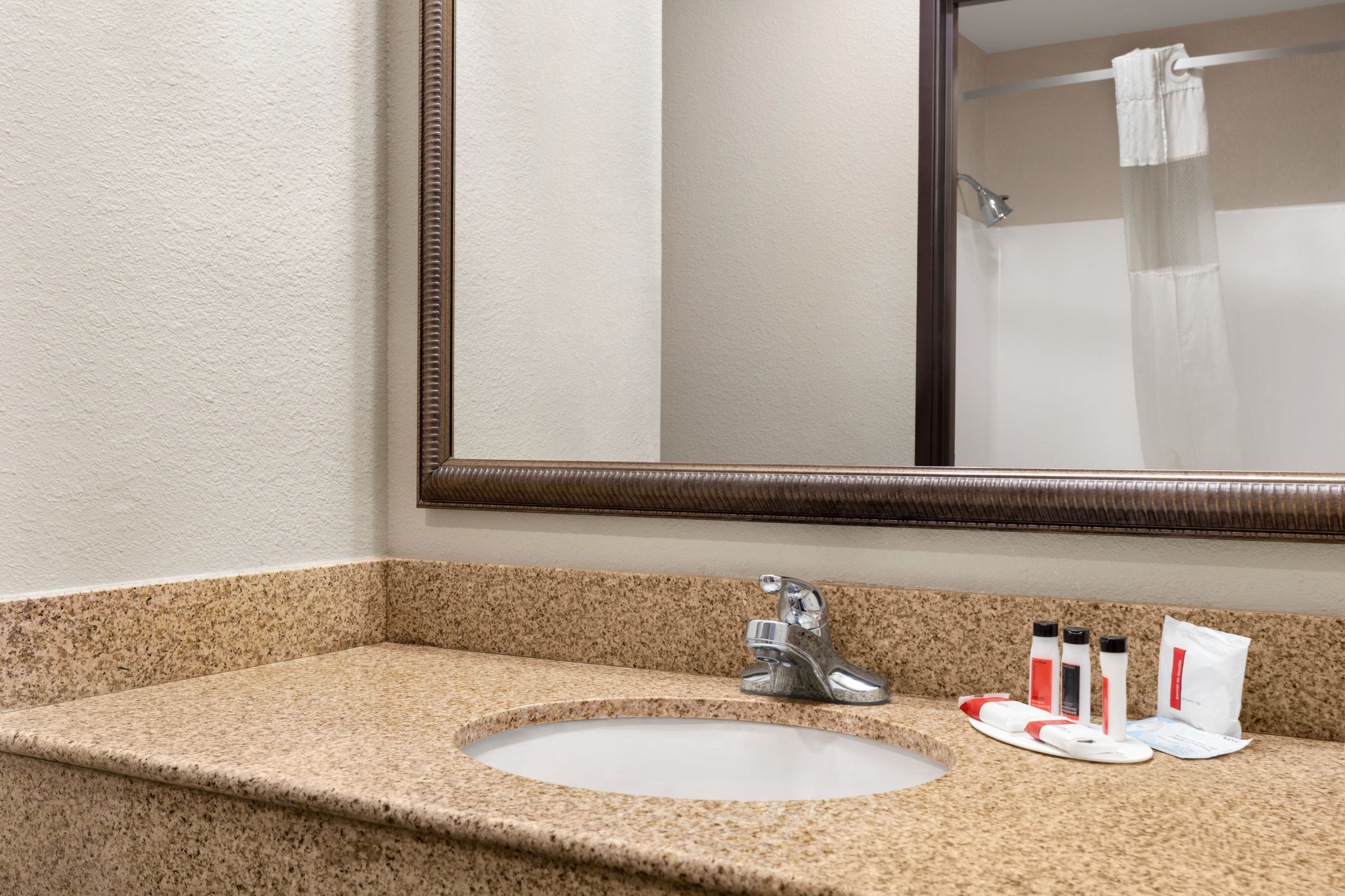 Guest room bath at the Ramada by Wyndham Elizabethtown in Elizabethtown, Kentucky
