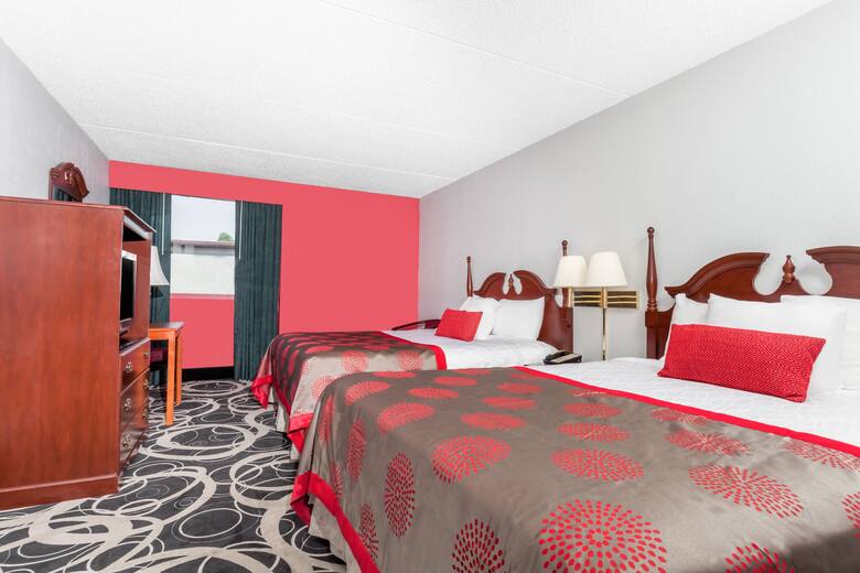 Guest room at the Ramada Henderson/Evansville in Henderson, Kentucky