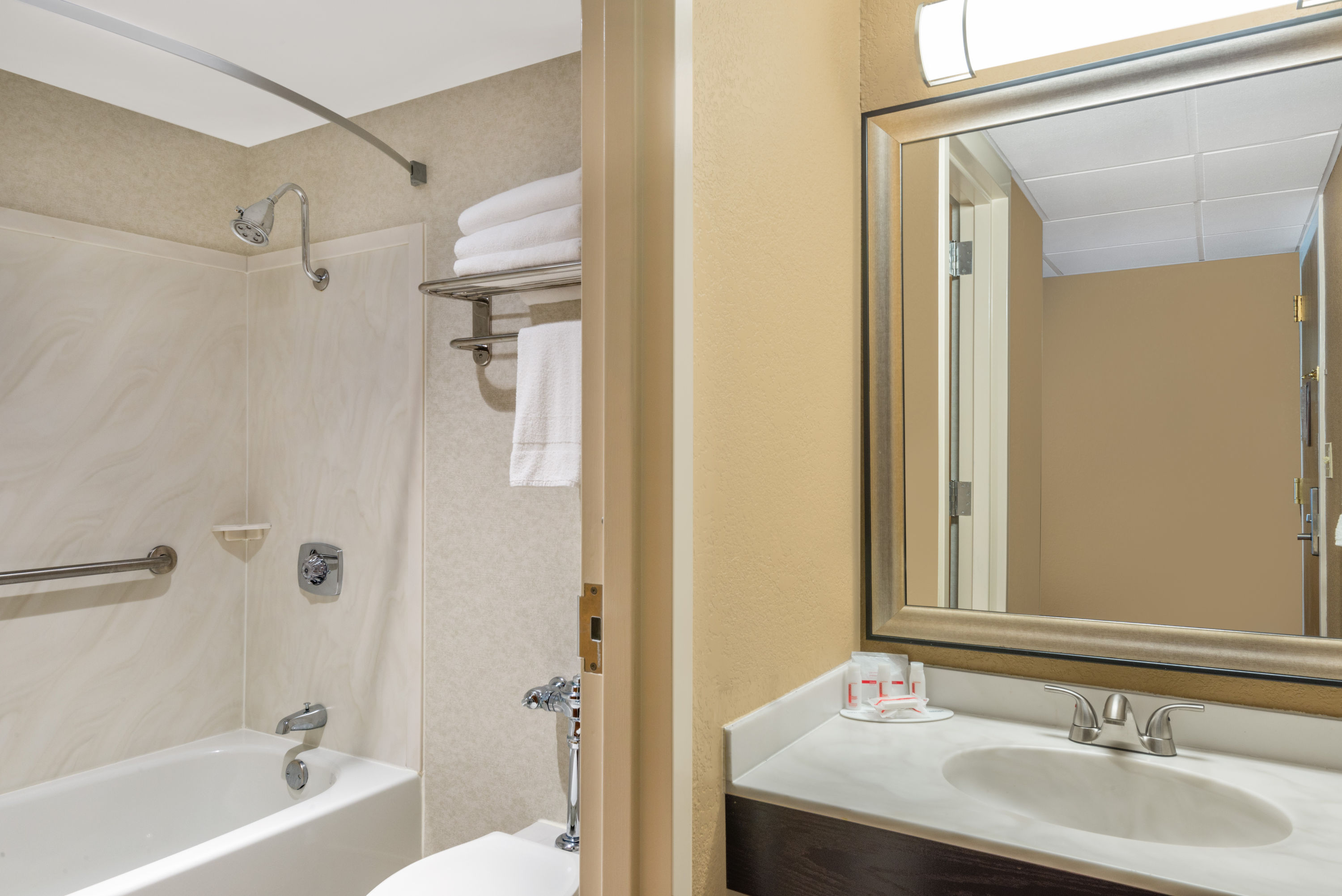 Guest room bath at the Ramada by Wyndham Paintsville Hotel & Conference Center in Paintsville, Kentucky