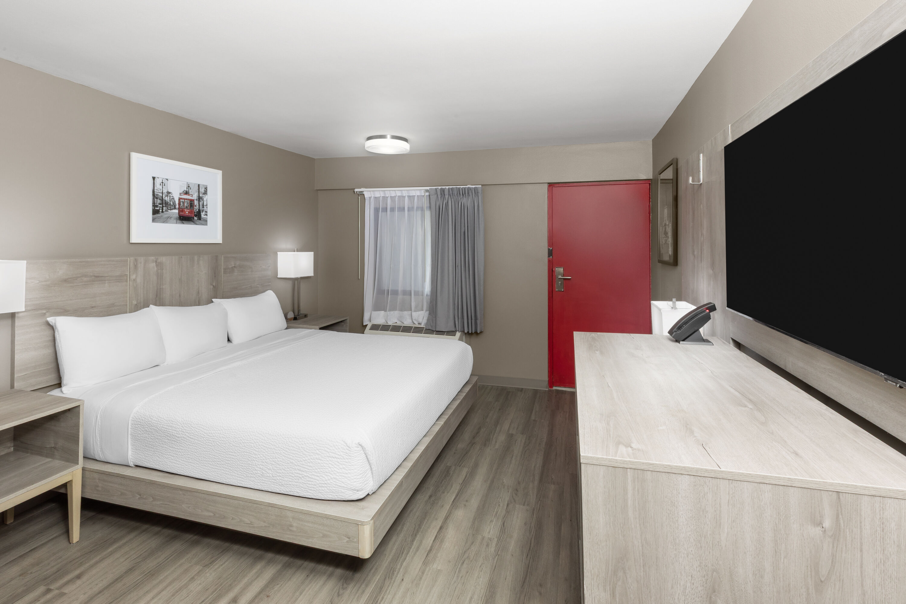 Guest room at the Ramada by Wyndham Kenner/New Orleans Airport South in Kenner, Louisiana