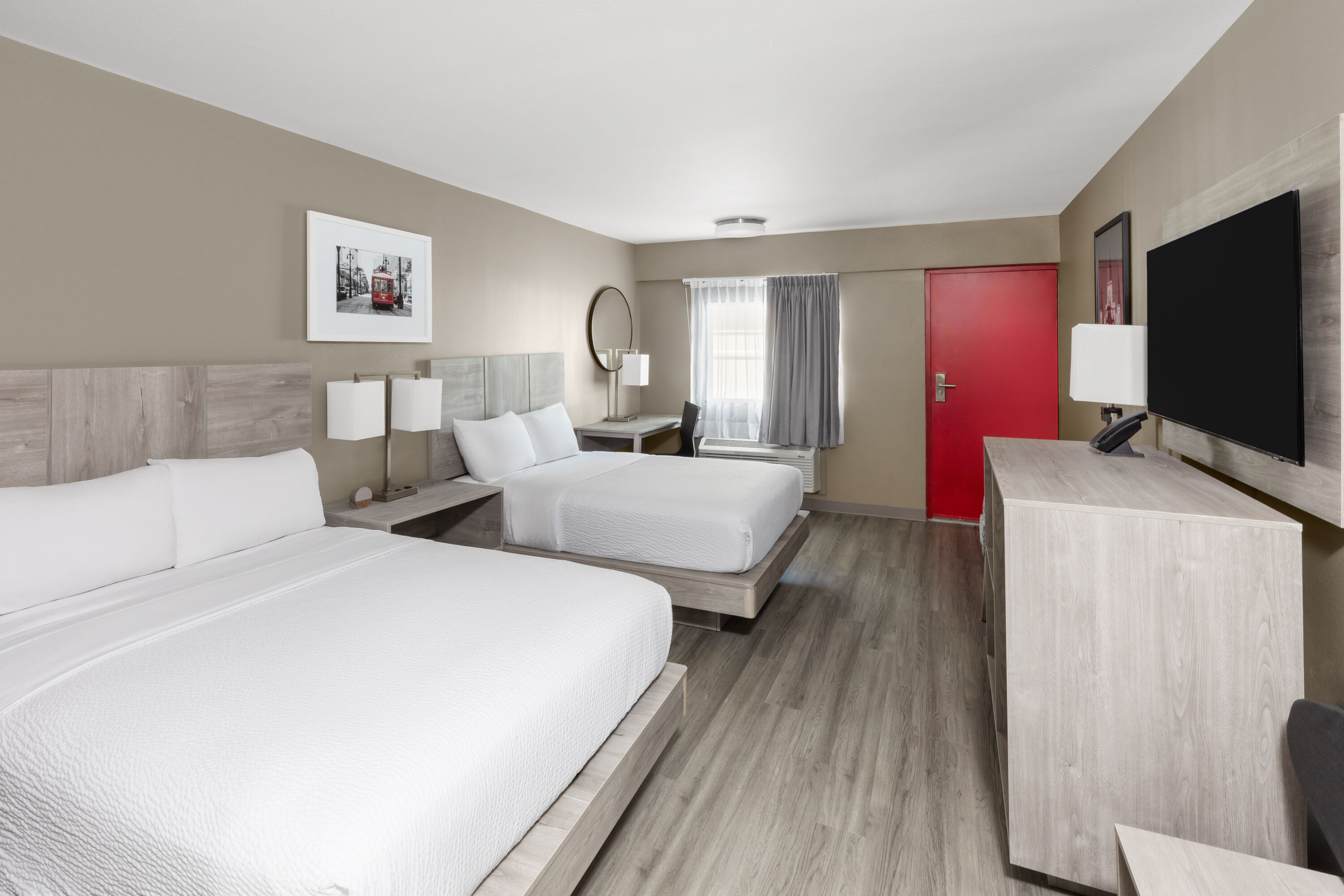 Guest room at the Ramada by Wyndham Kenner/New Orleans Airport South in Kenner, Louisiana