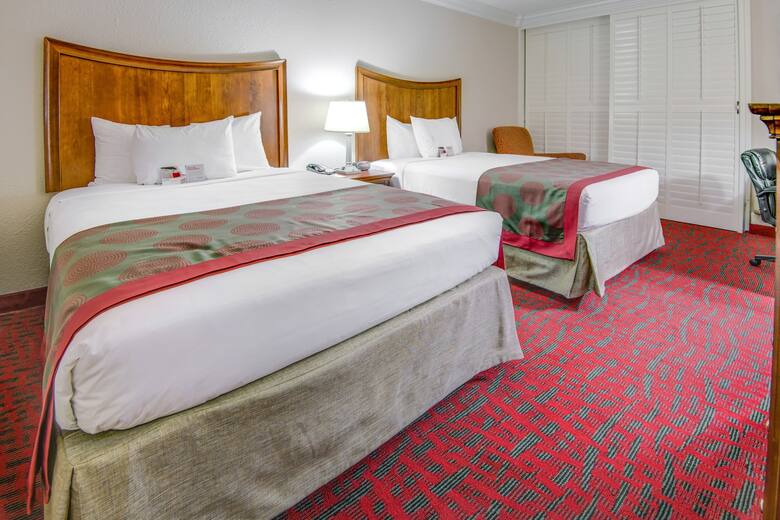 Guest room at the Ramada Metairie New Orleans Airport in Metairie, Louisiana