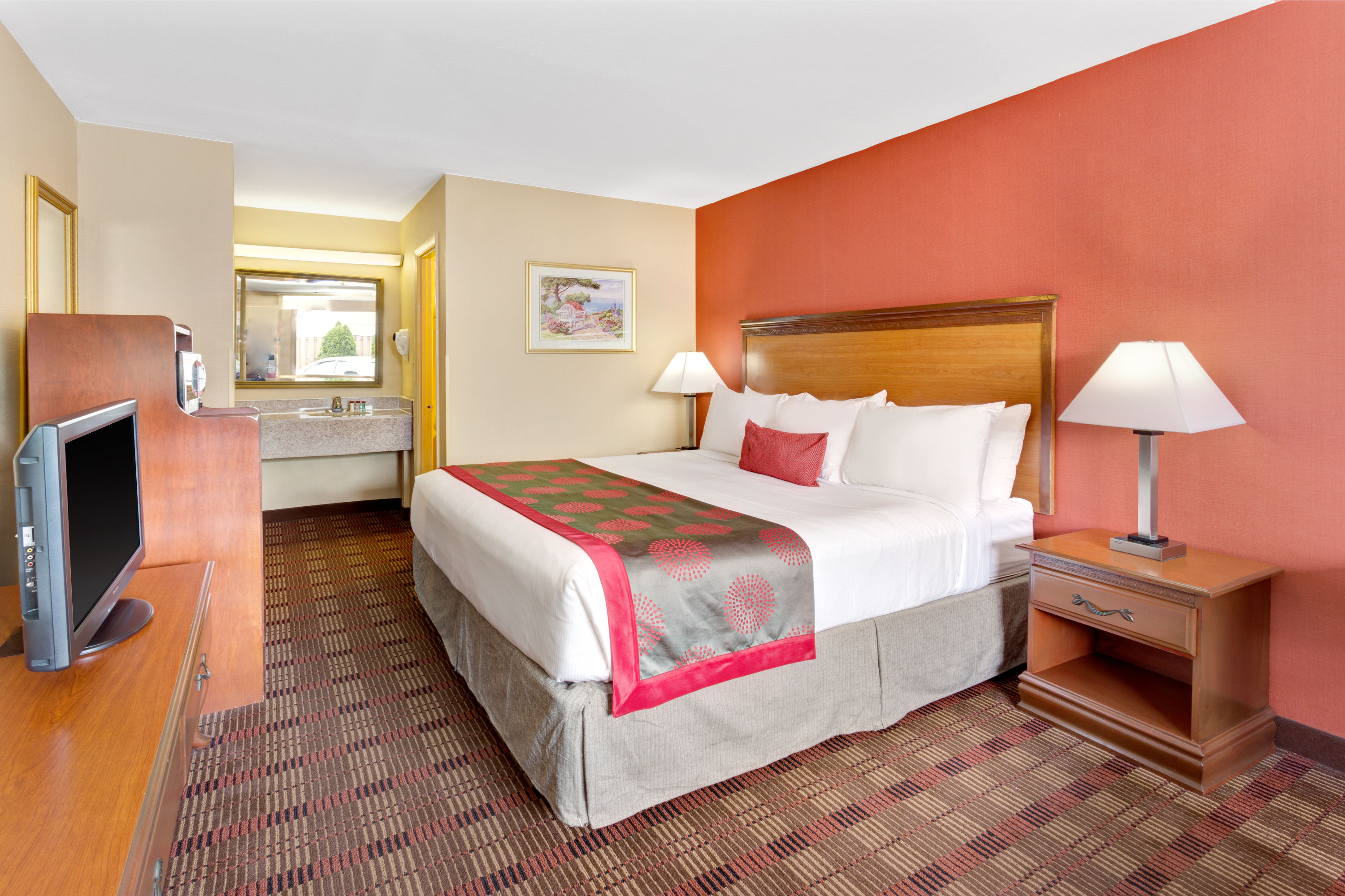 Guest room at the Ramada by Wyndham Baltimore West in Baltimore, Maryland