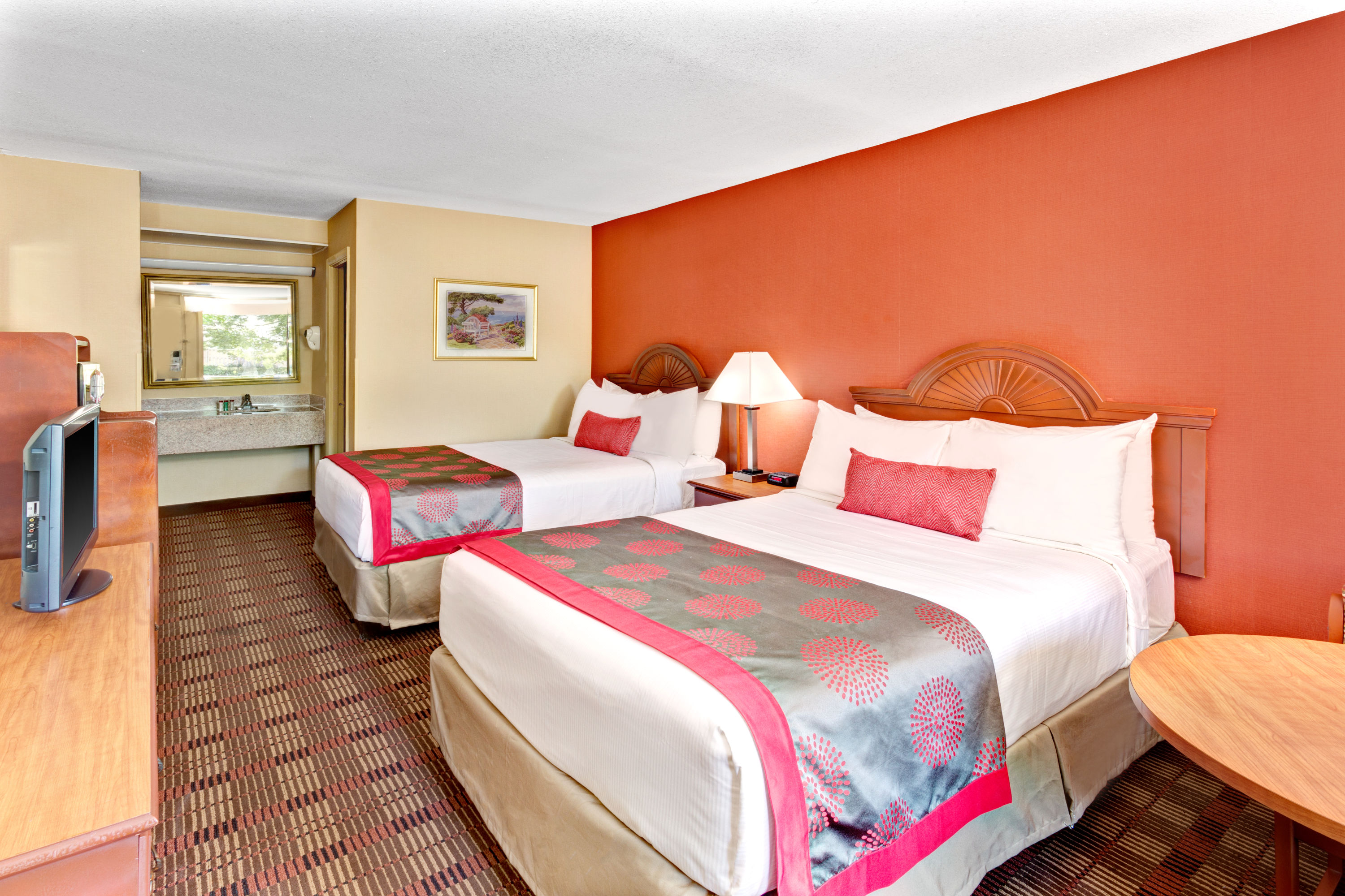 Guest room at the Ramada by Wyndham Baltimore West in Baltimore, Maryland