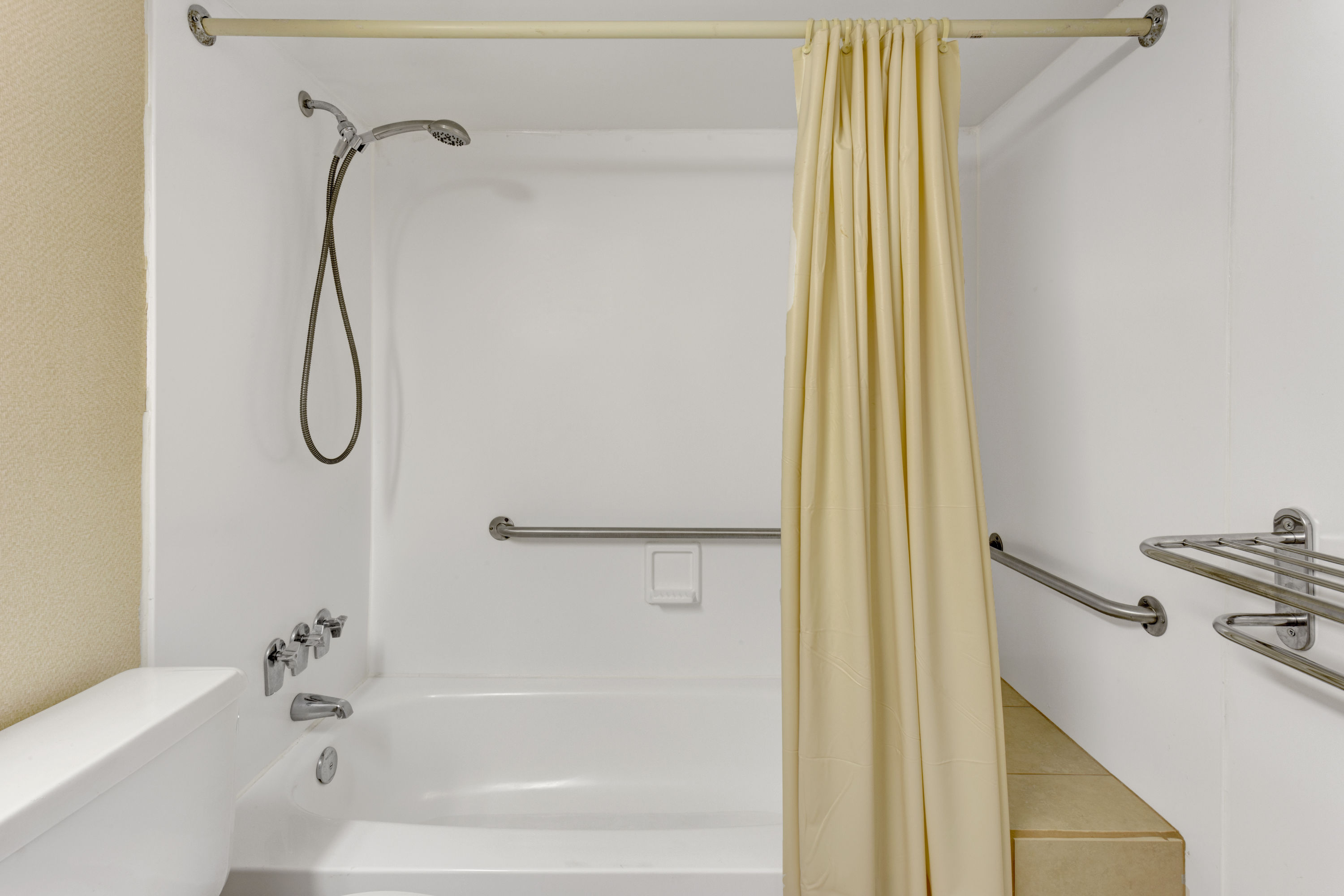 Guest room at the Ramada by Wyndham Baltimore West in Baltimore, Maryland