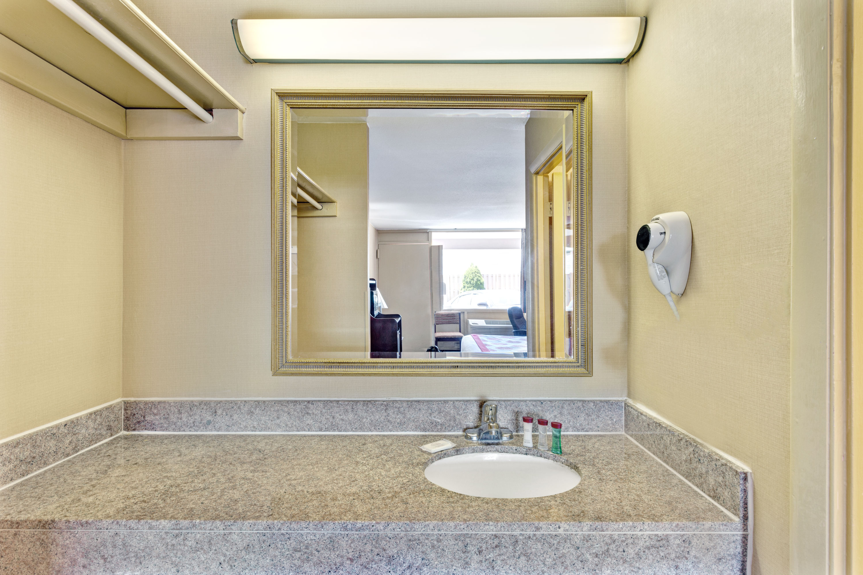 Guest room at the Ramada by Wyndham Baltimore West in Baltimore, Maryland