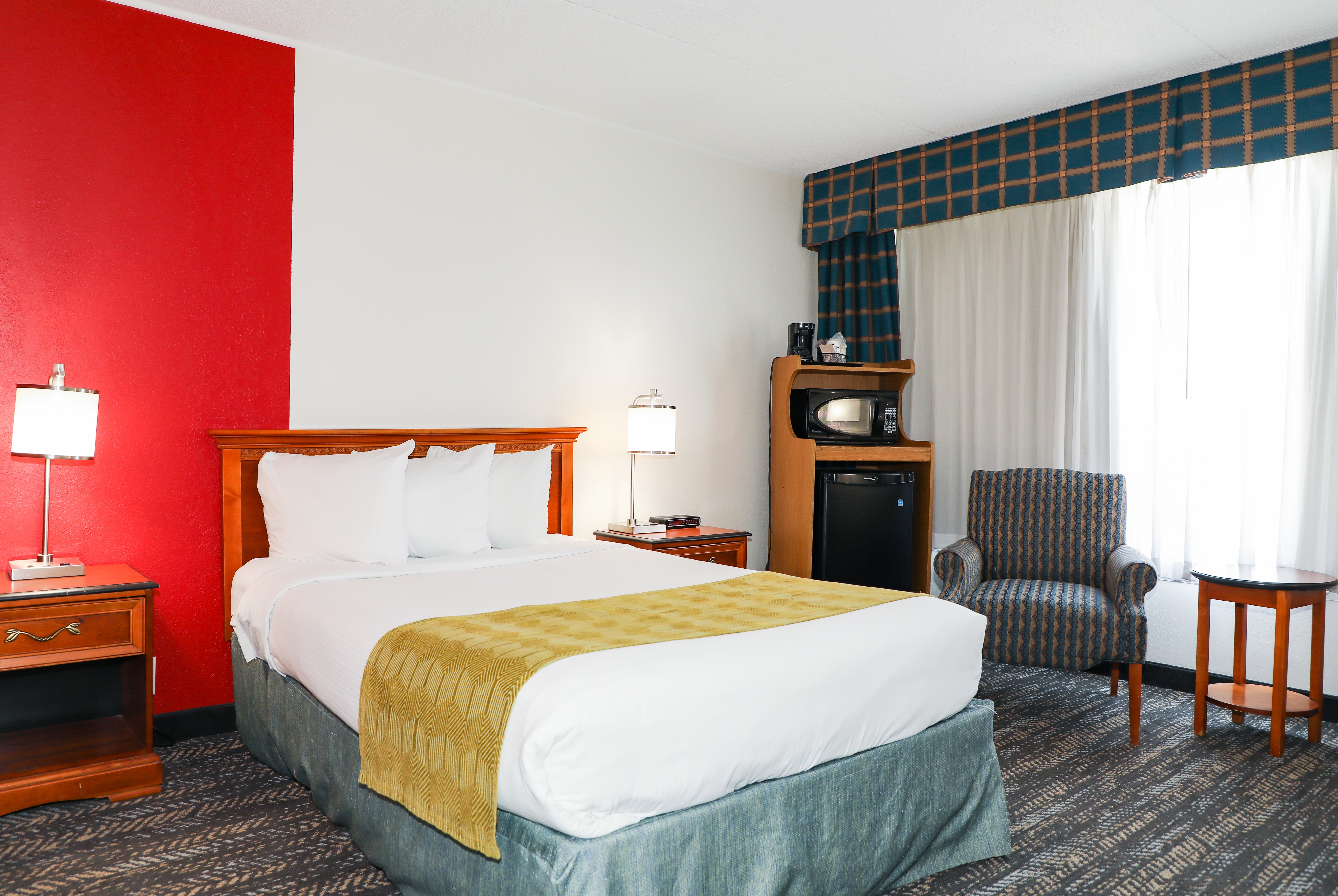 Guest room at the Ramada by Wyndham Cumberland Downtown in Cumberland, Maryland