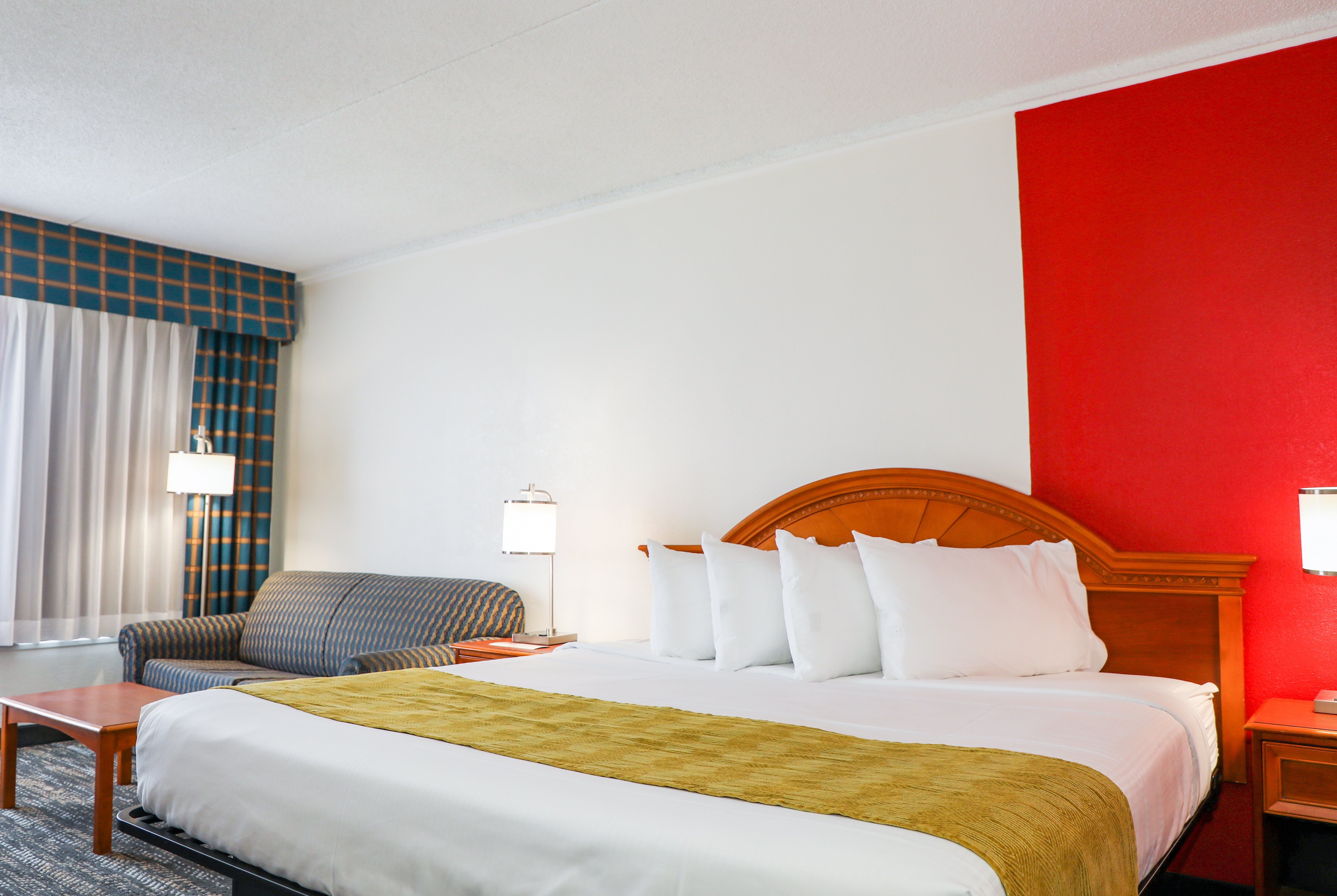 Guest room at the Ramada by Wyndham Cumberland Downtown in Cumberland, Maryland