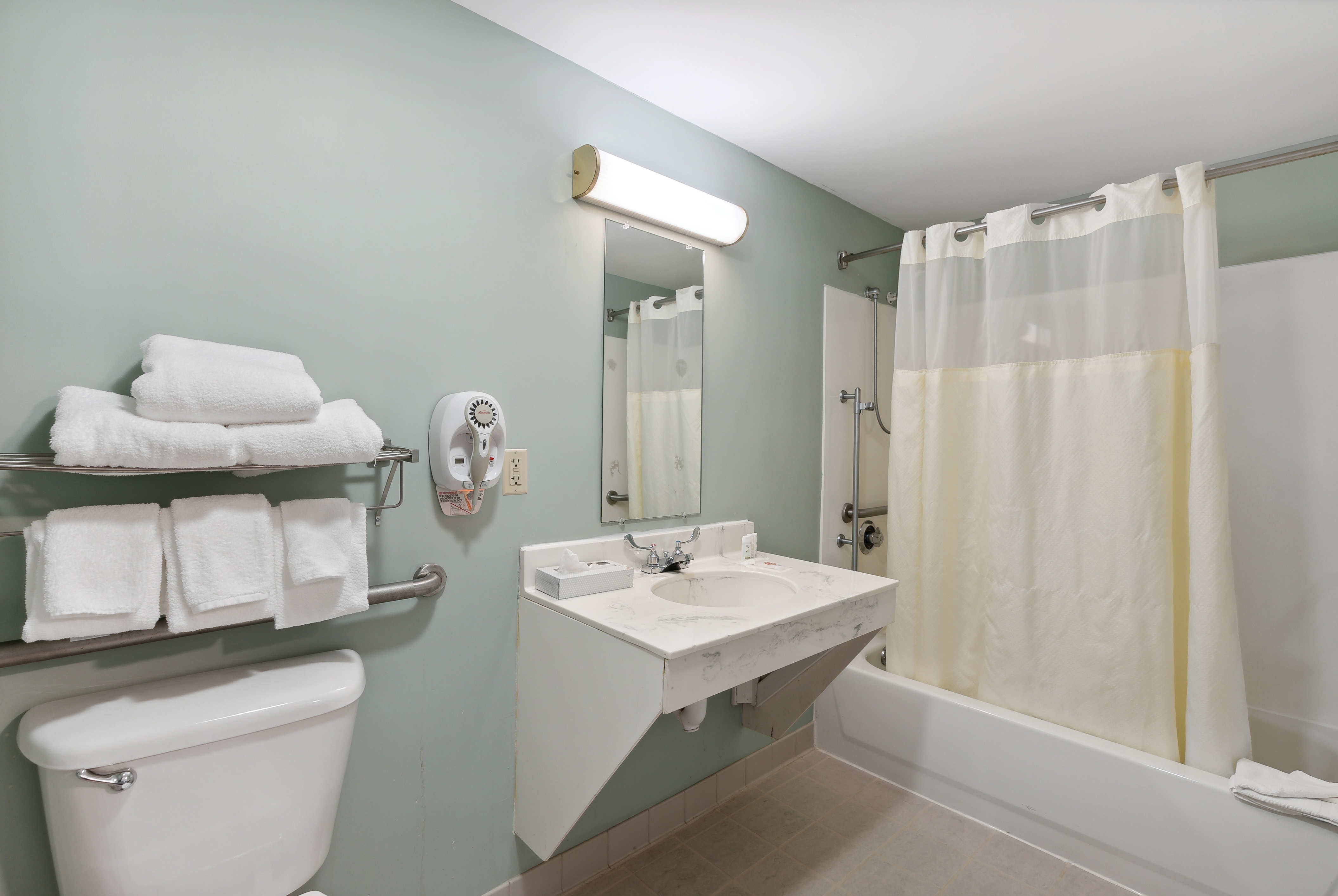Guest room bath at the Ramada by Wyndham Saco/Old Orchard Beach Area in Saco, Maine