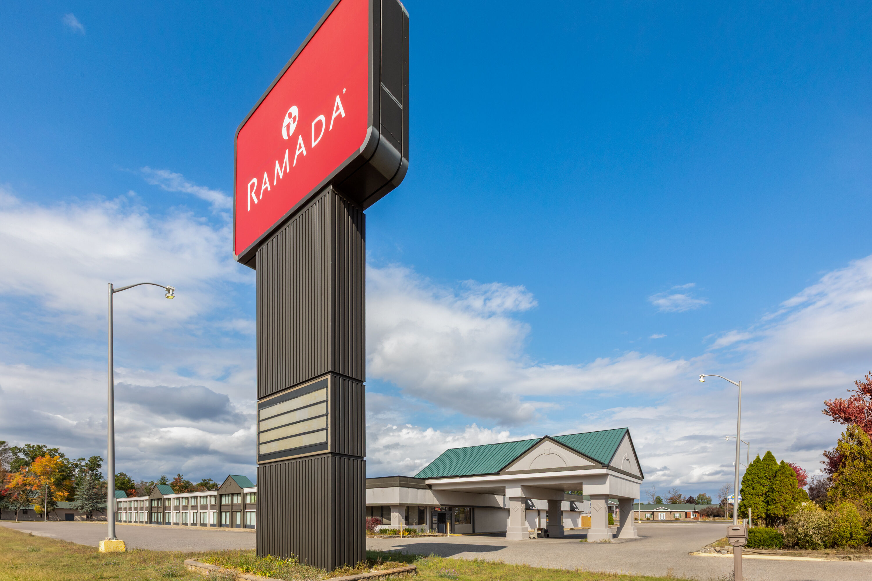 Exterior Day Image of Ramada by Wyndham Grayling Hotel & Conference Center hotel in Grayling, Michigan