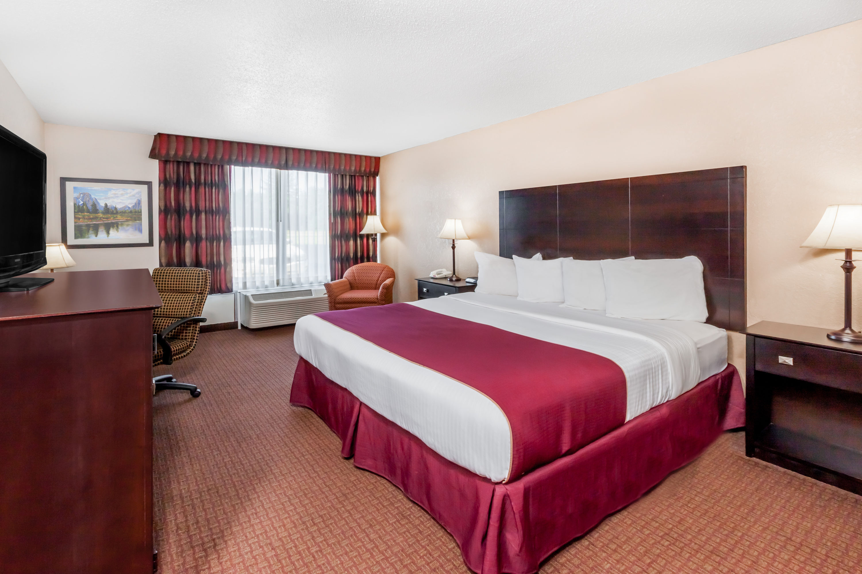 Guest room at the Ramada by Wyndham Grayling Hotel & Conference Center in Grayling, Michigan