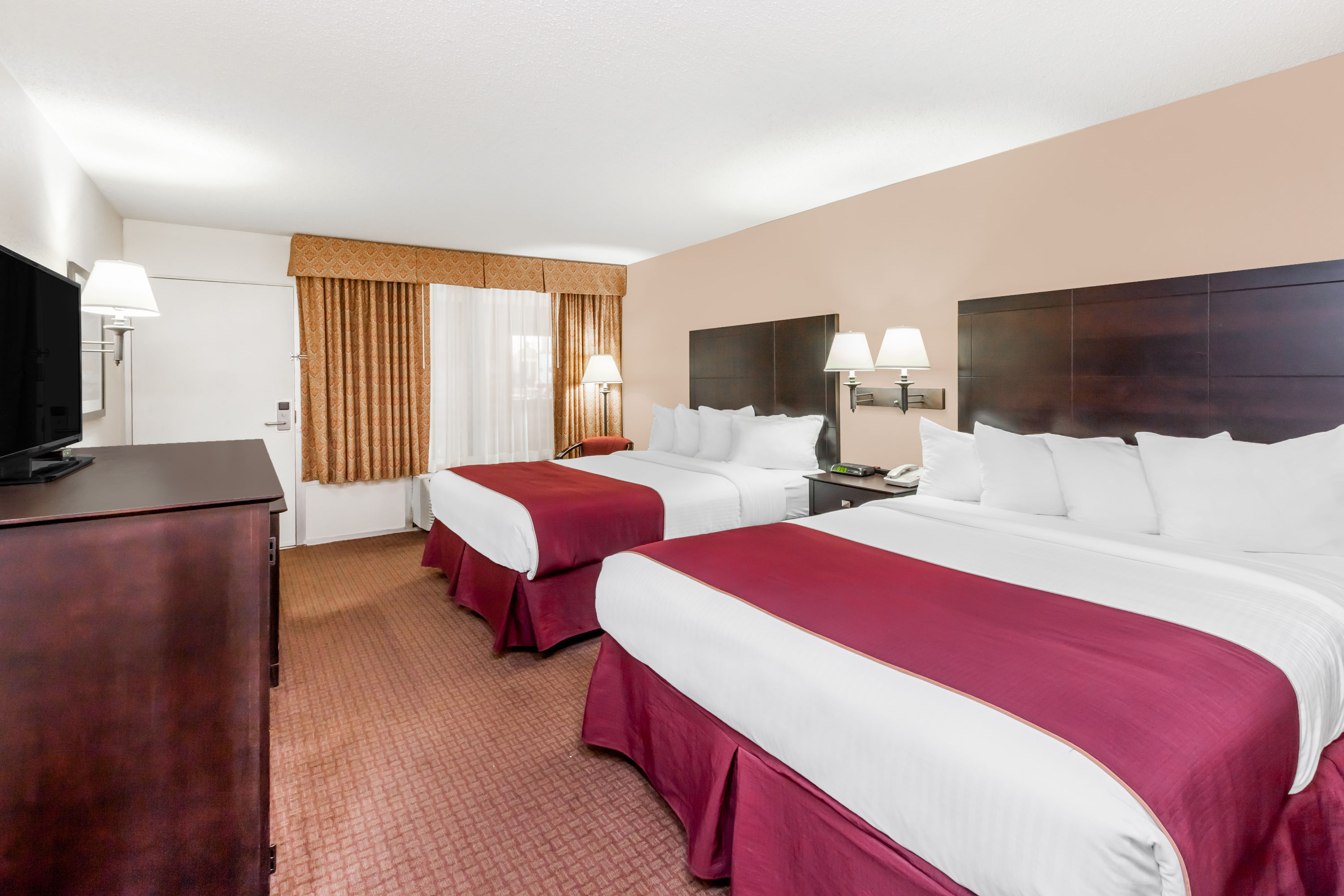 Guest room at the Ramada by Wyndham Grayling Hotel & Conference Center in Grayling, Michigan