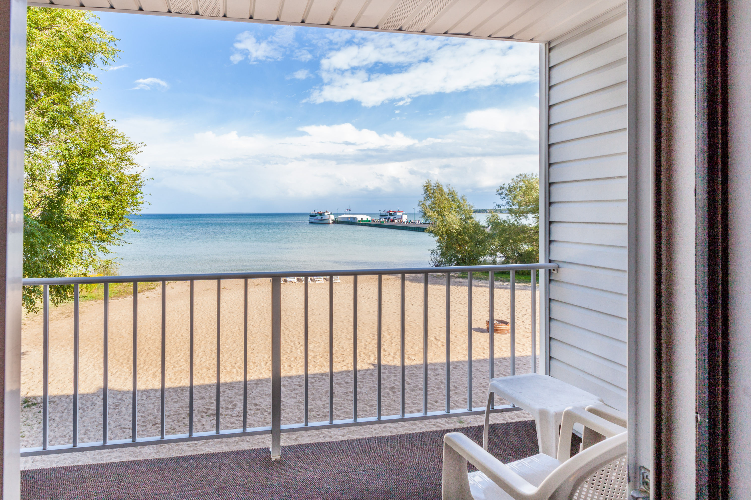 Guest room balcony at Ramada by Wyndham Mackinaw City Waterfront in Mackinaw City, Michigan
