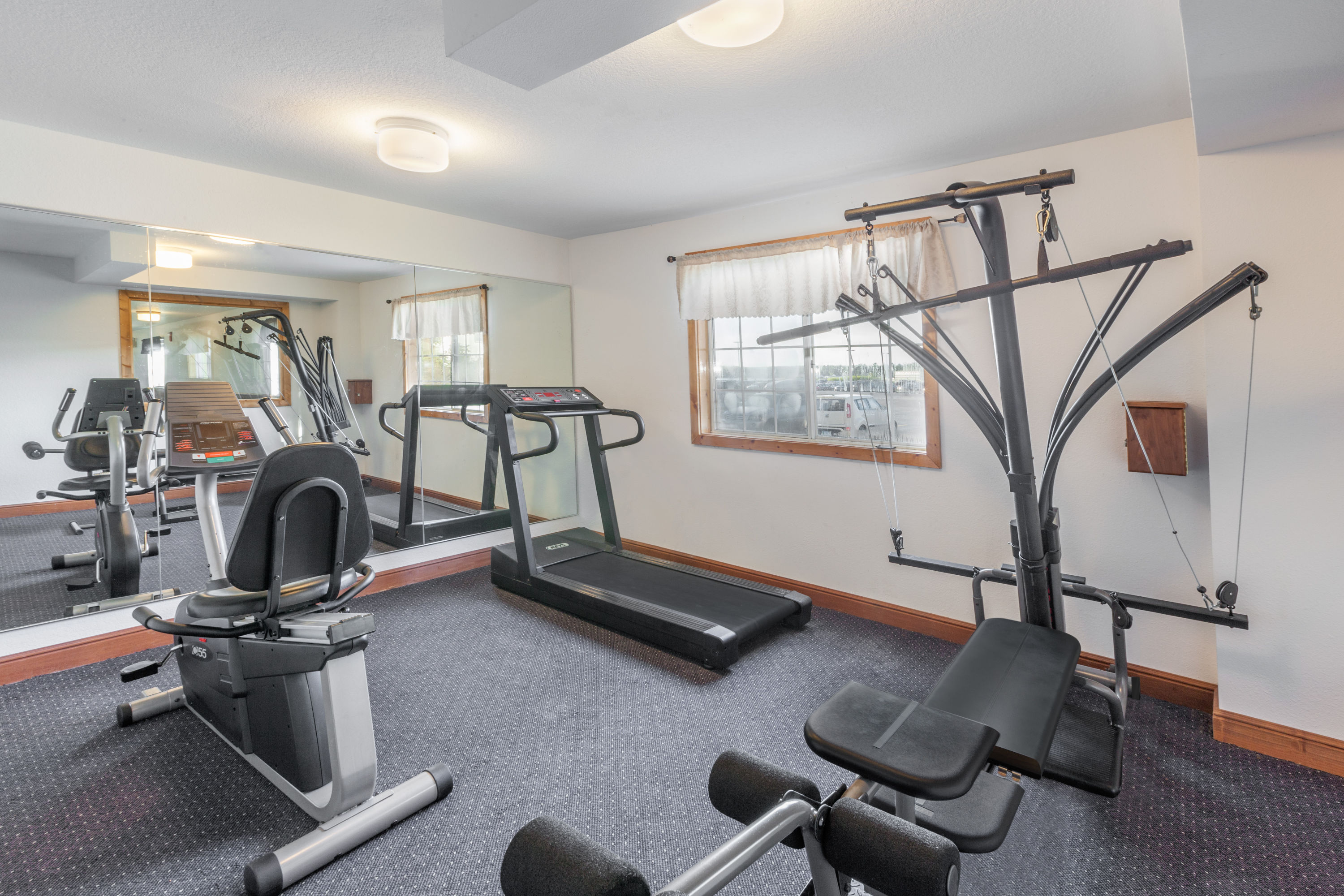 Fitness room at Ramada by Wyndham Mackinaw City Waterfront in Mackinaw City, Michigan