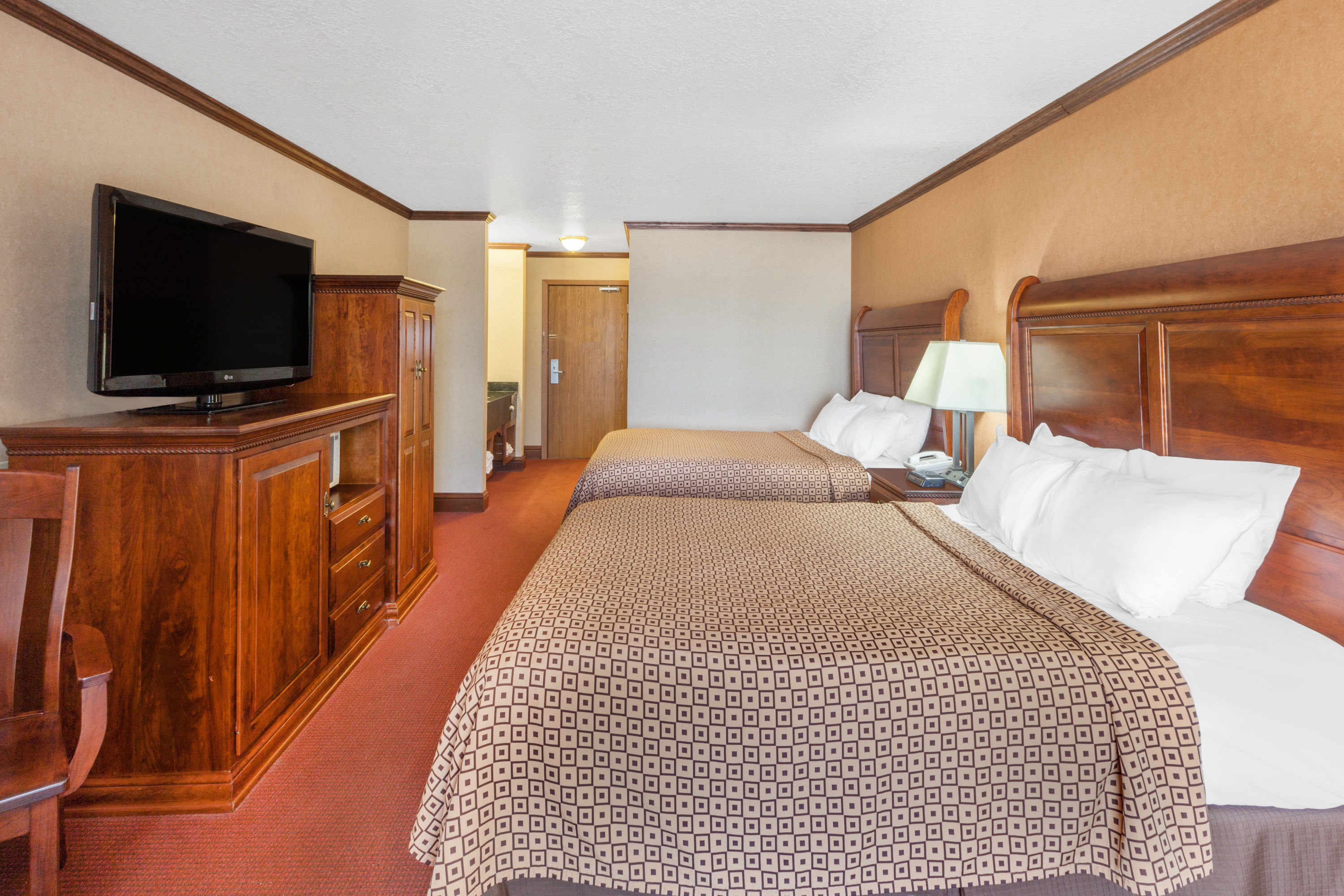 Guest room at the Ramada by Wyndham Mackinaw City Waterfront in Mackinaw City, Michigan