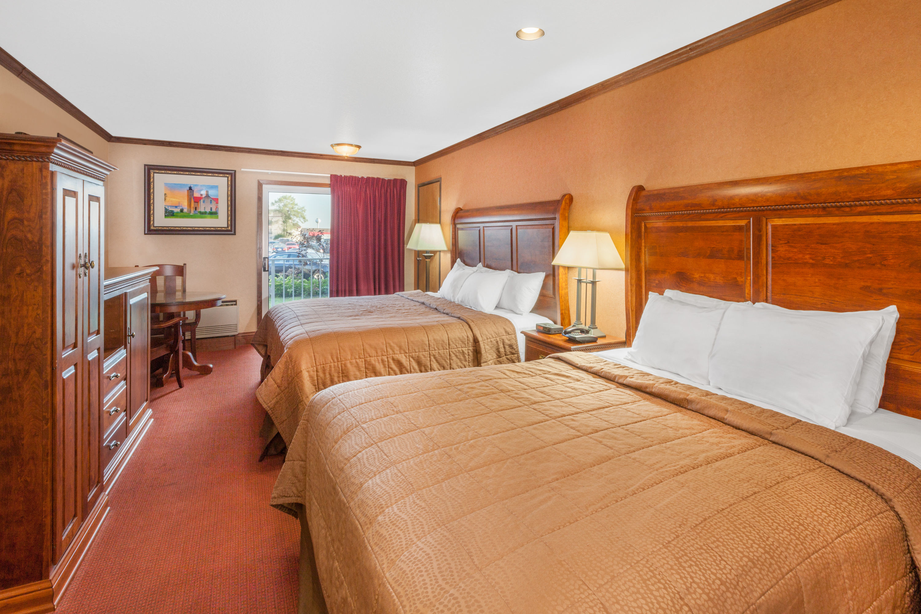 Guest room at the Ramada by Wyndham Mackinaw City Waterfront in Mackinaw City, Michigan
