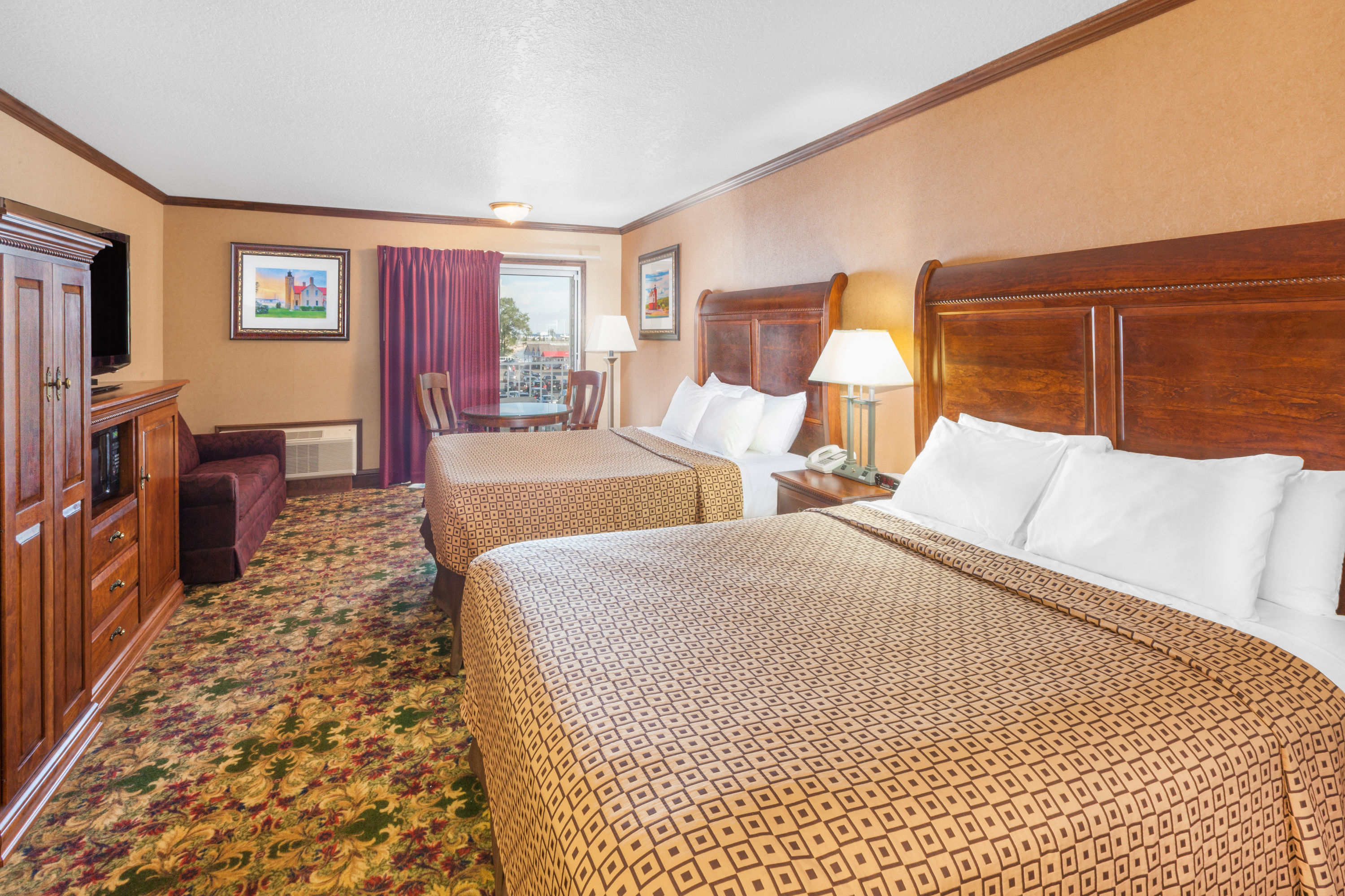 Guest room at the Ramada by Wyndham Mackinaw City Waterfront in Mackinaw City, Michigan