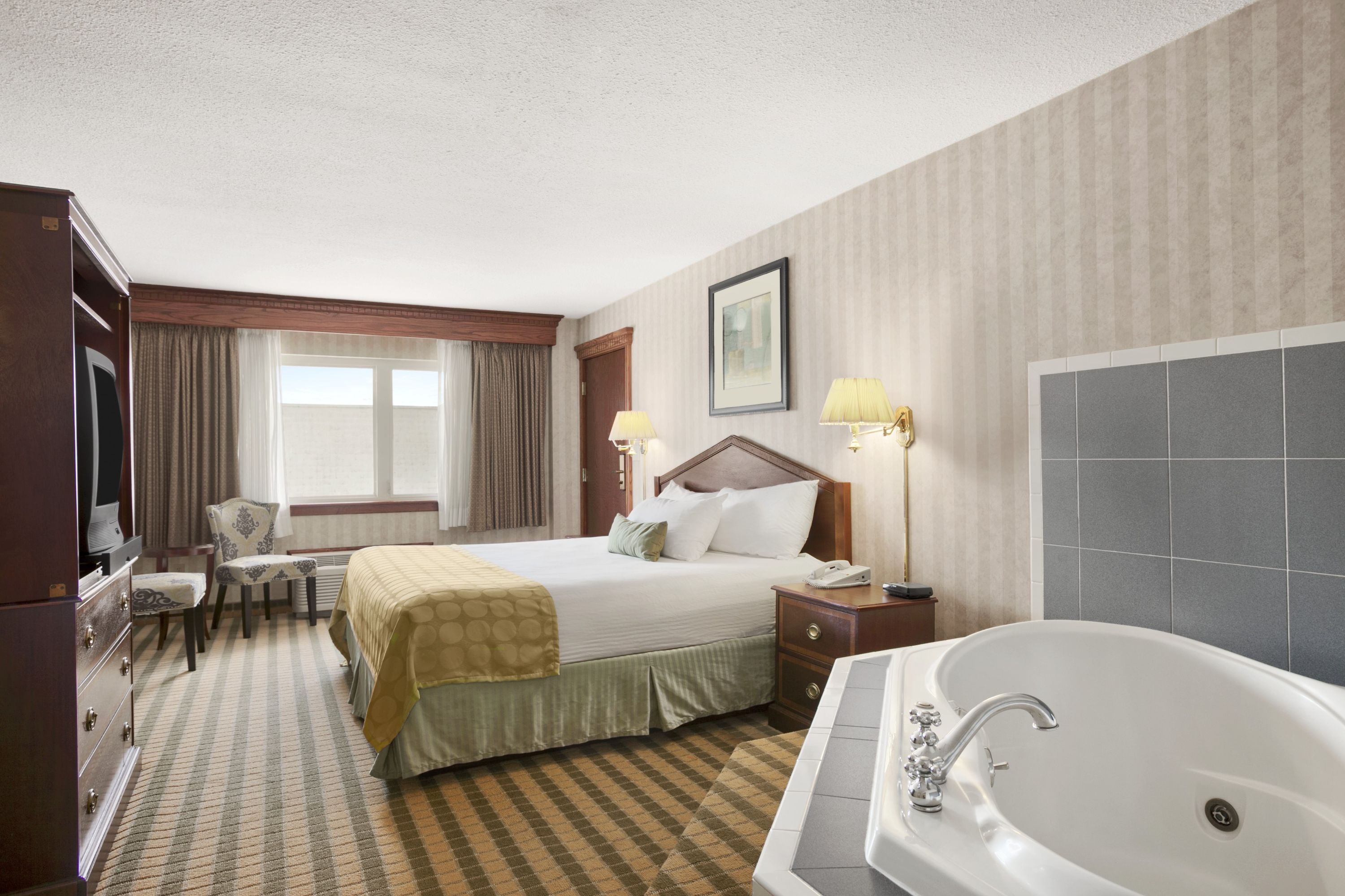Ramada by Wyndham Saginaw Hotel & Suites suite in Saginaw, Michigan