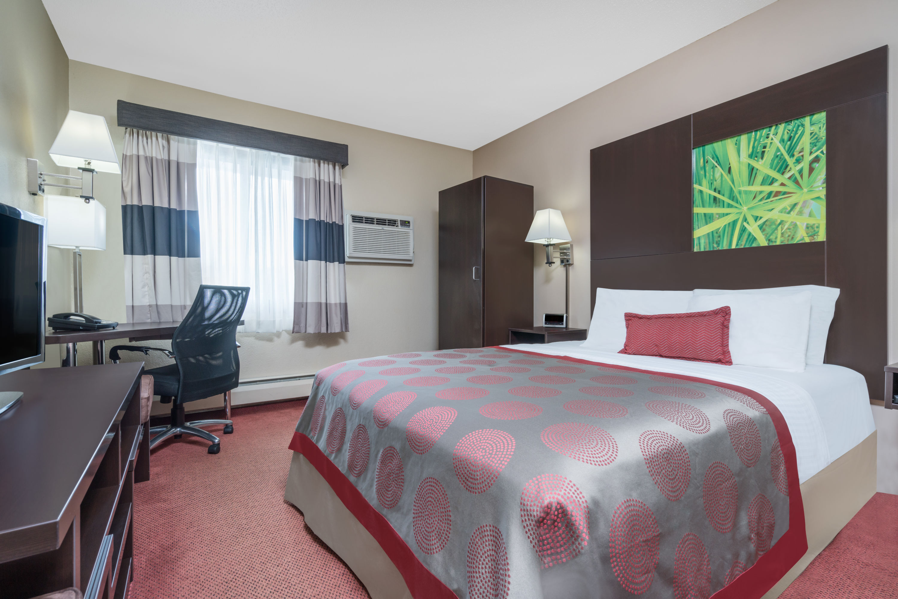 Guest room at the Ramada by Wyndham Minneapolis Golden Valley in Golden Valley, Minnesota