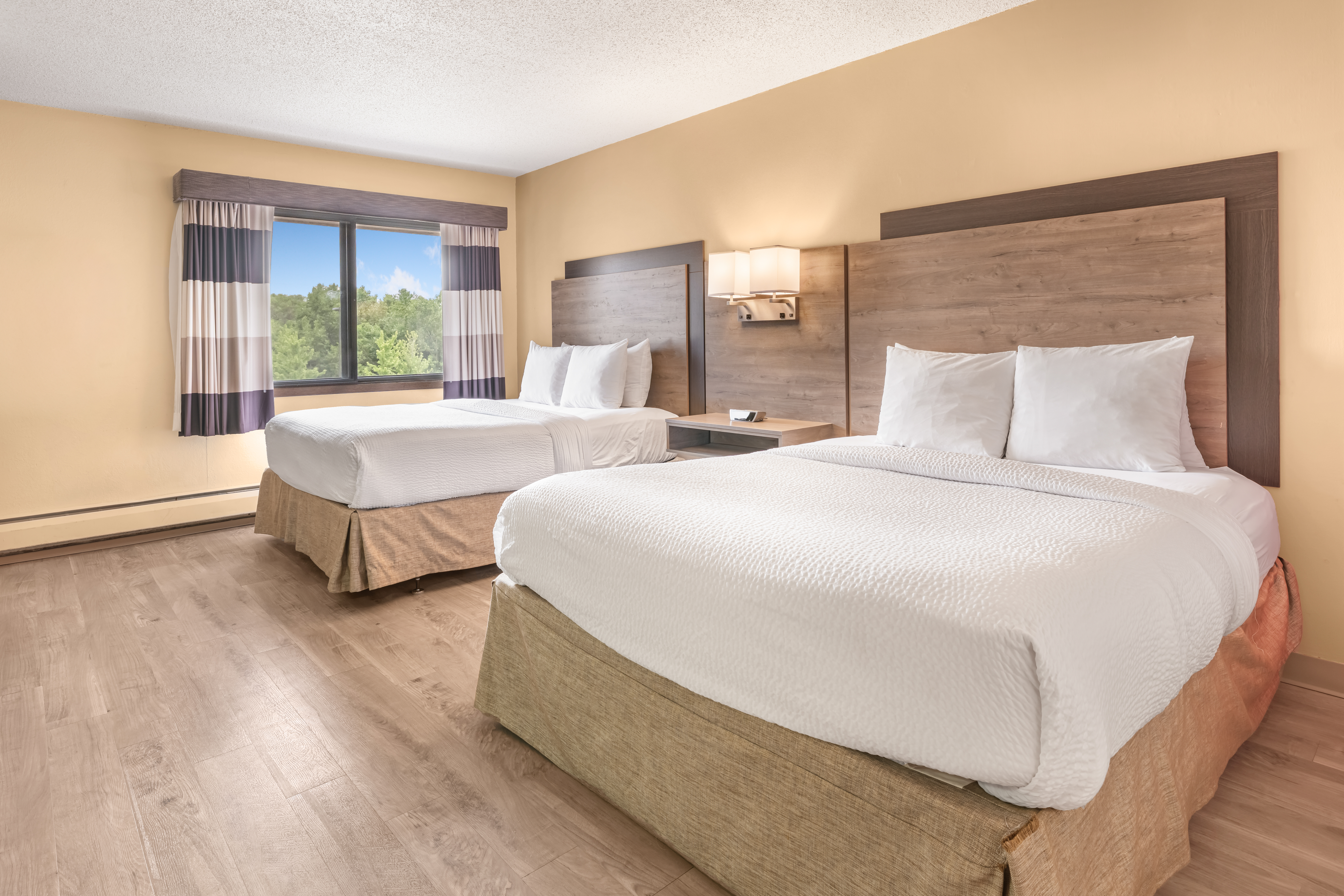 Guest room at the Ramada by Wyndham Minneapolis Golden Valley in Golden Valley, Minnesota