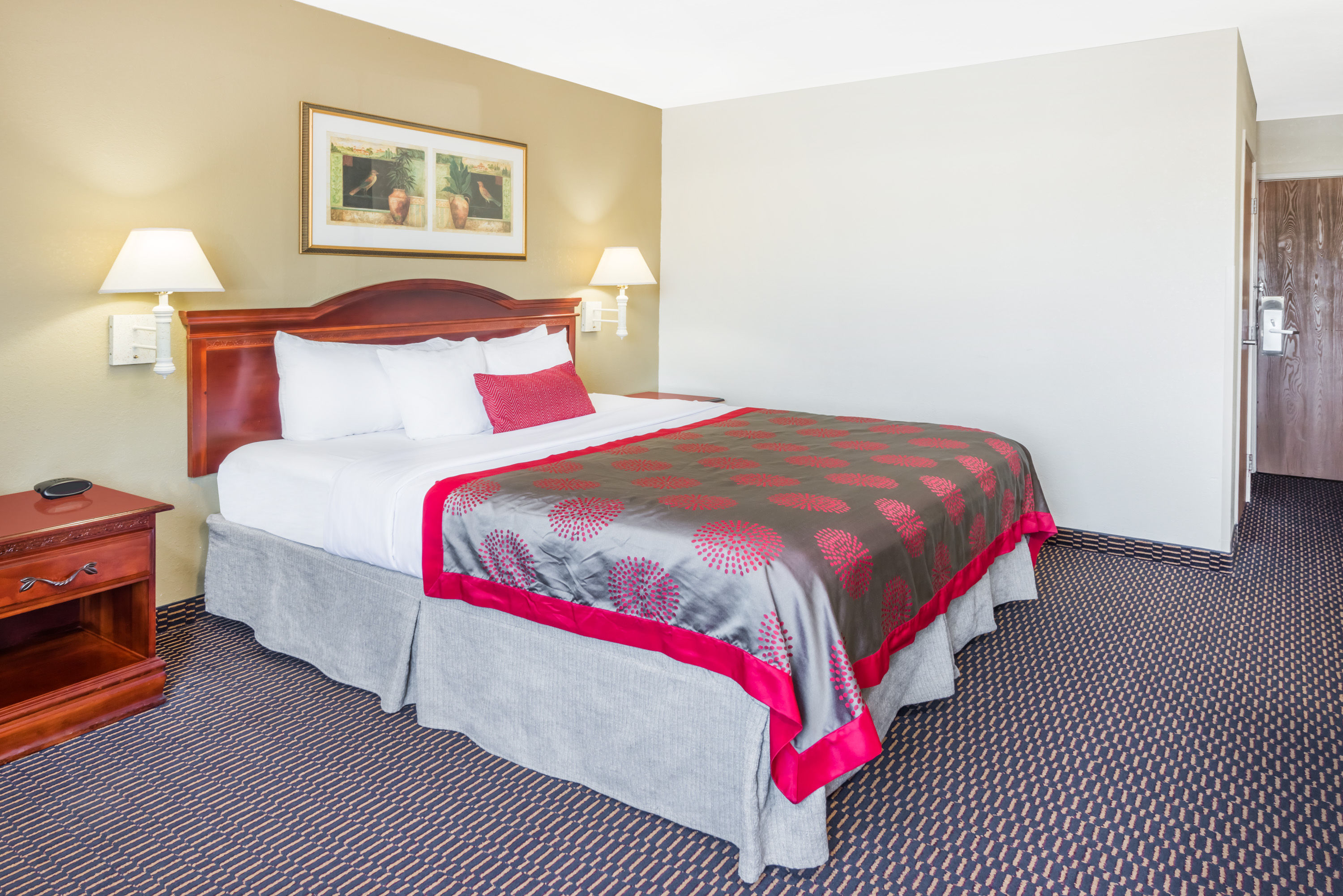 Guest room at the Ramada by Wyndham Columbia in Columbia, Missouri