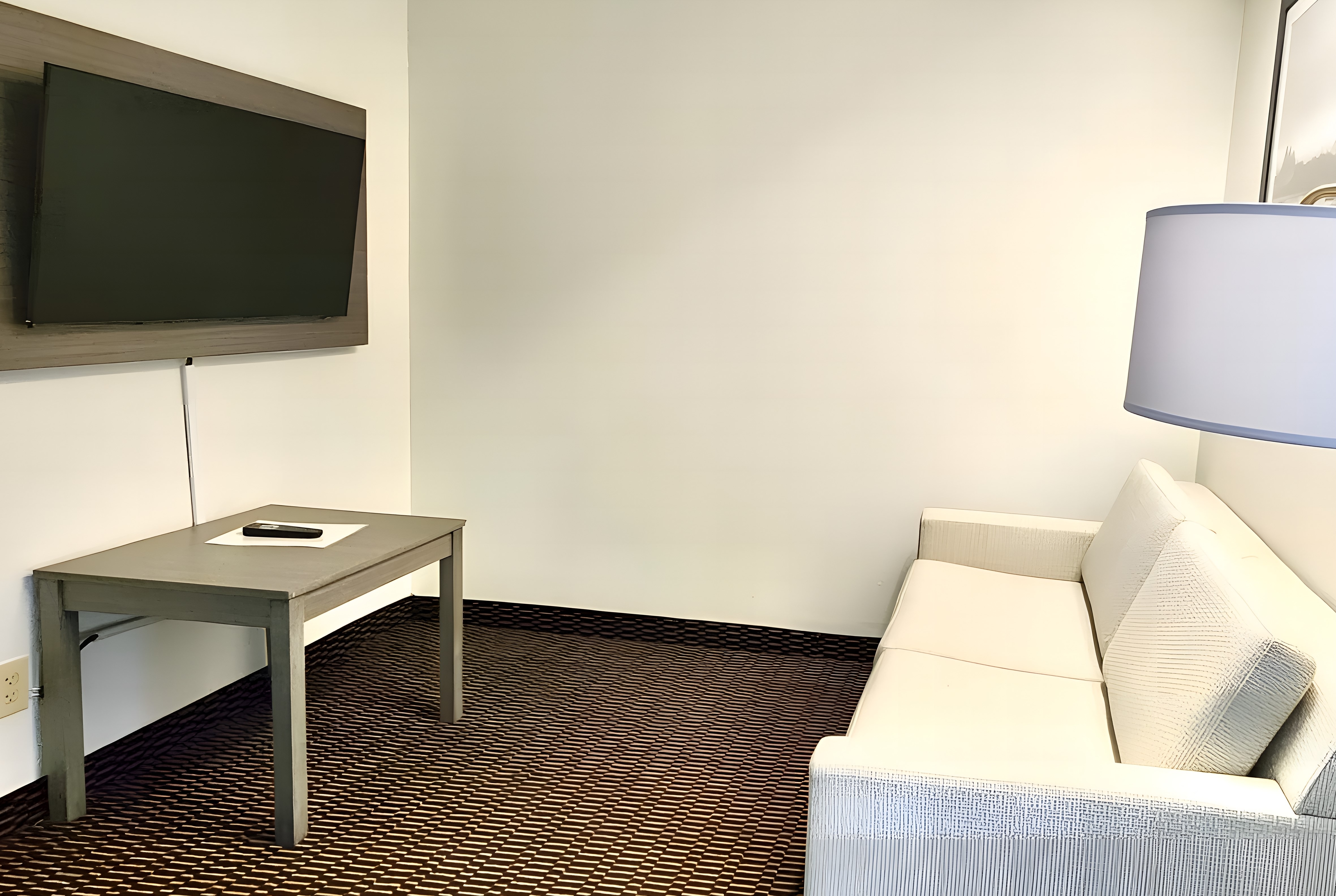 Guest room at the Ramada by Wyndham Columbia in Columbia, Missouri