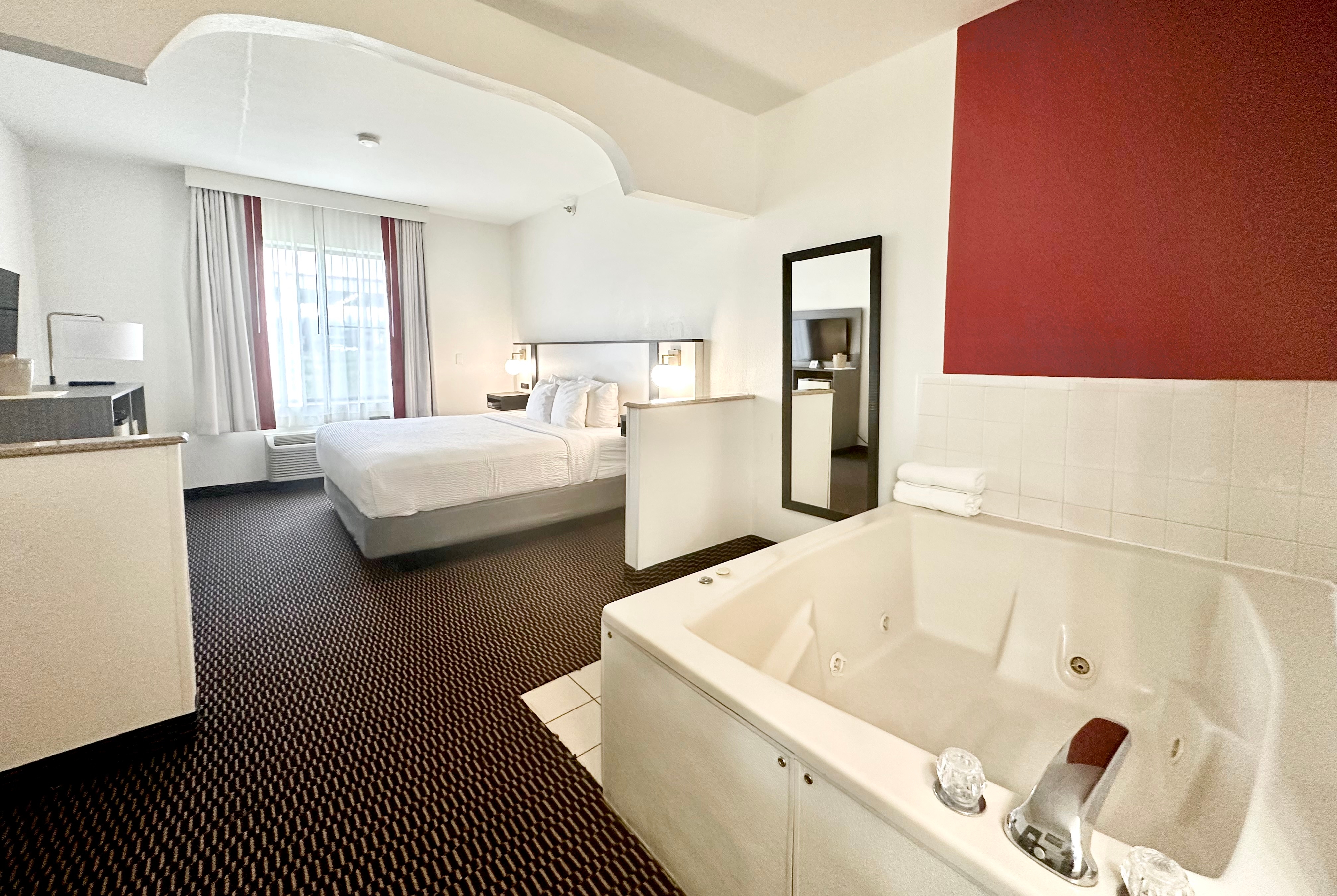 Guest room at the Ramada by Wyndham Columbia in Columbia, Missouri