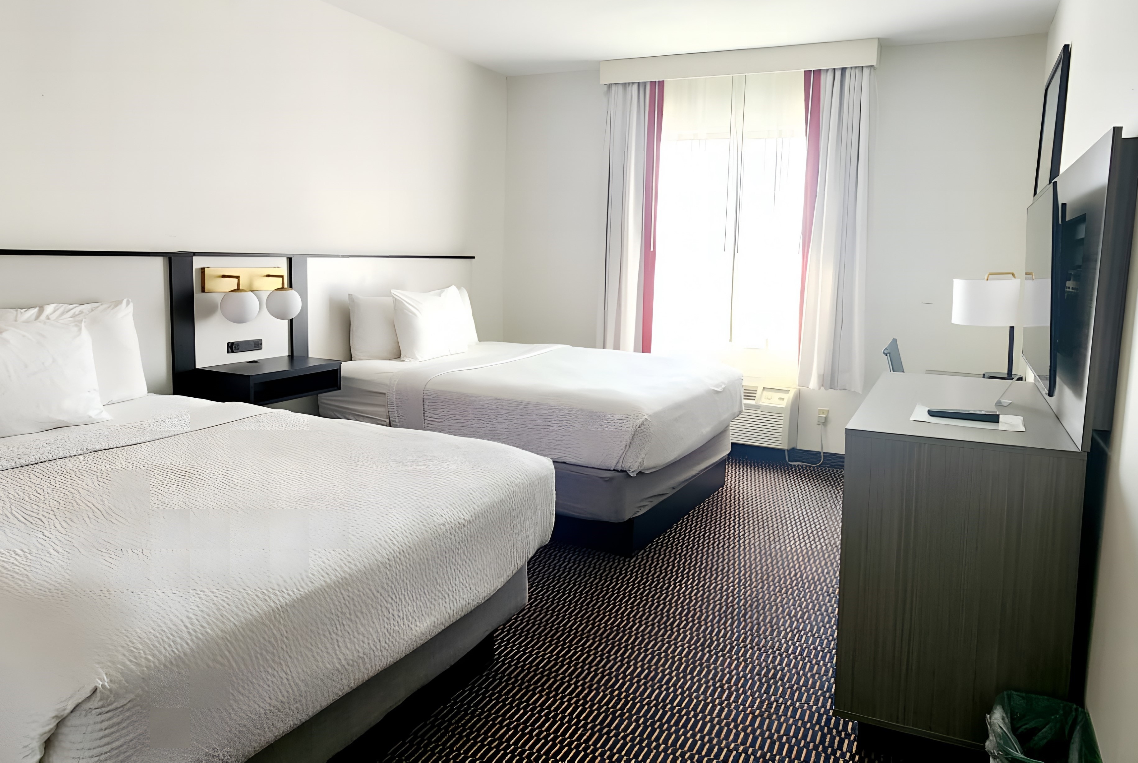 Guest room at the Ramada by Wyndham Columbia in Columbia, Missouri