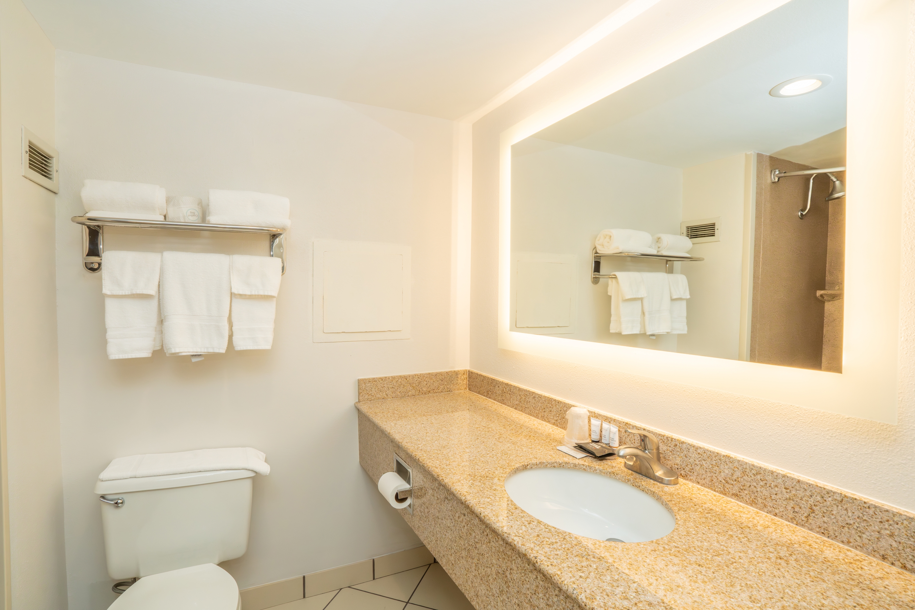 Guest room bath at the Elimwood Hotel, a Ramada by Wyndham in Maryland Heights, Missouri