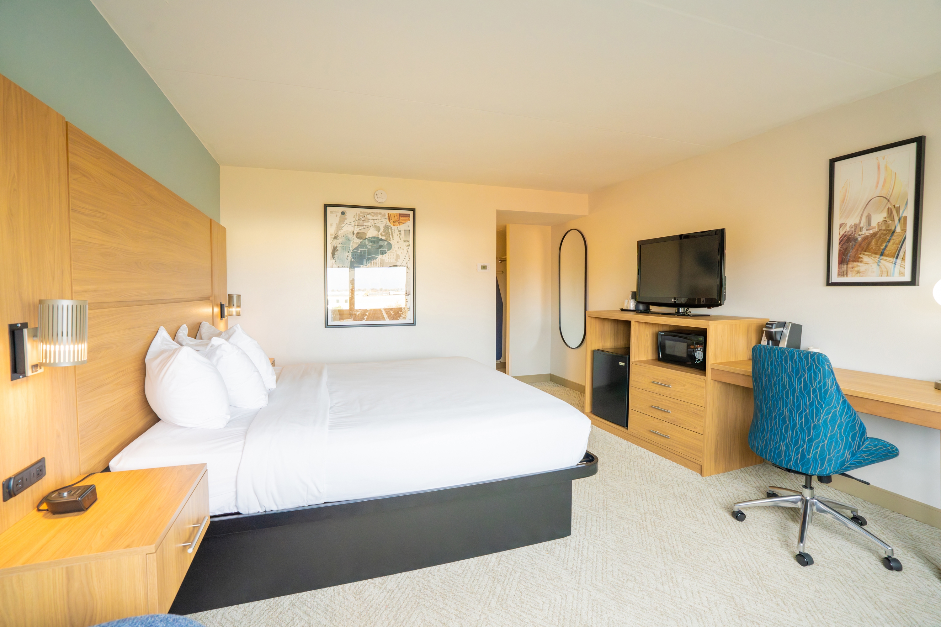 Guest room at the Elimwood Hotel, a Ramada by Wyndham in Maryland Heights, Missouri