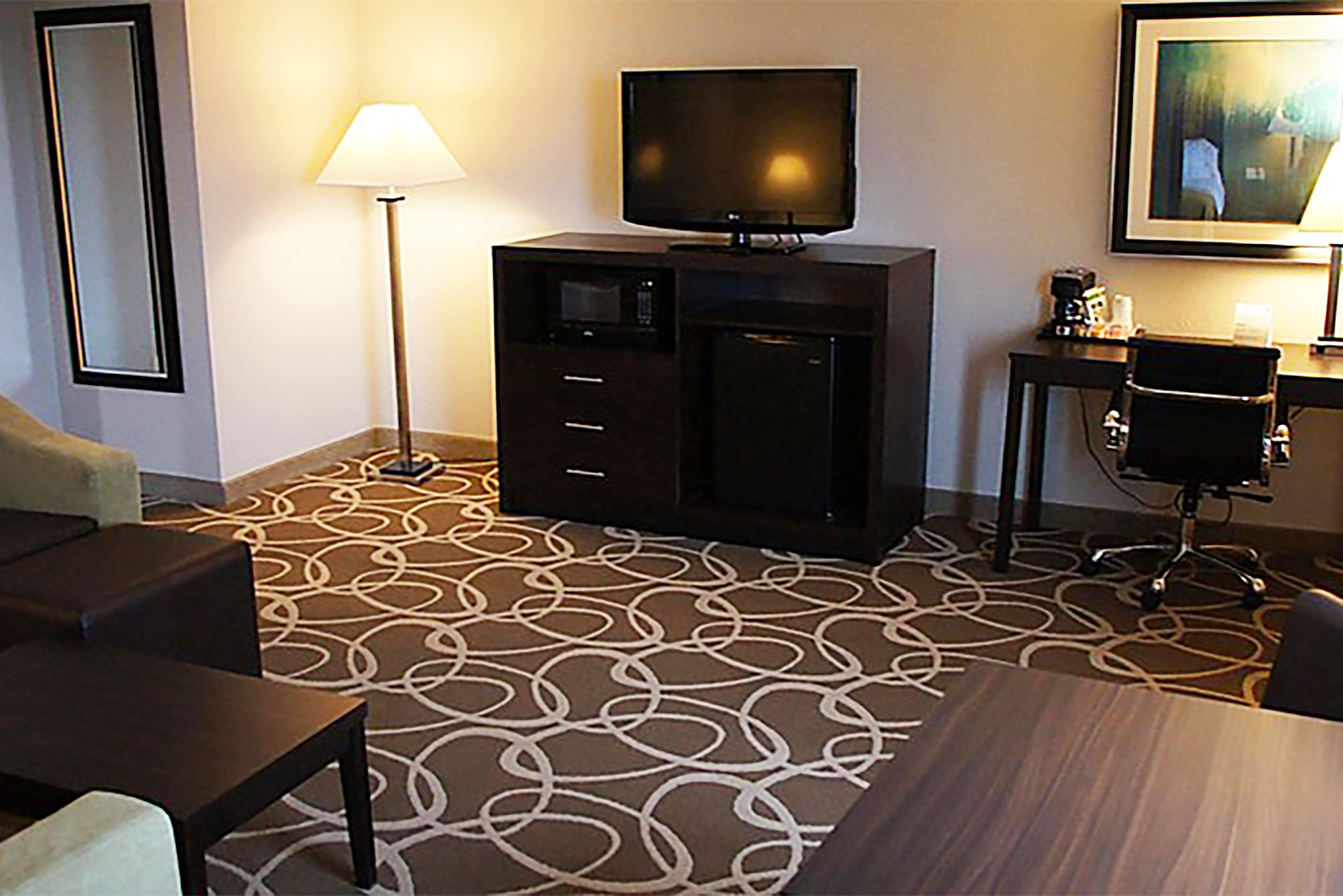 Guest room at the Elimwood Hotel, a Ramada by Wyndham in Maryland Heights, Missouri
