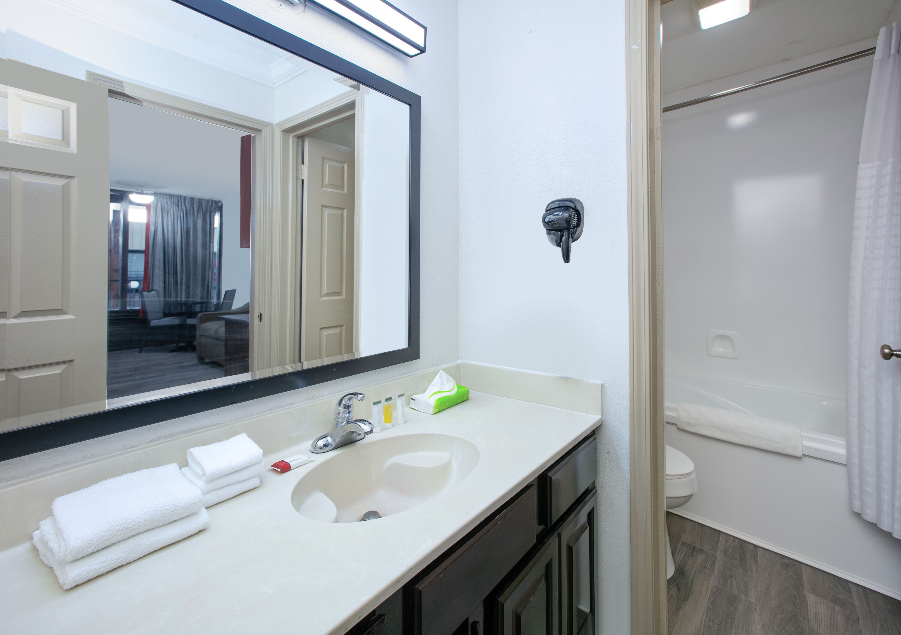 Guest room bath at the Ramada by Wyndham Diamondhead I-10/Gulfport in Diamondhead, Mississippi