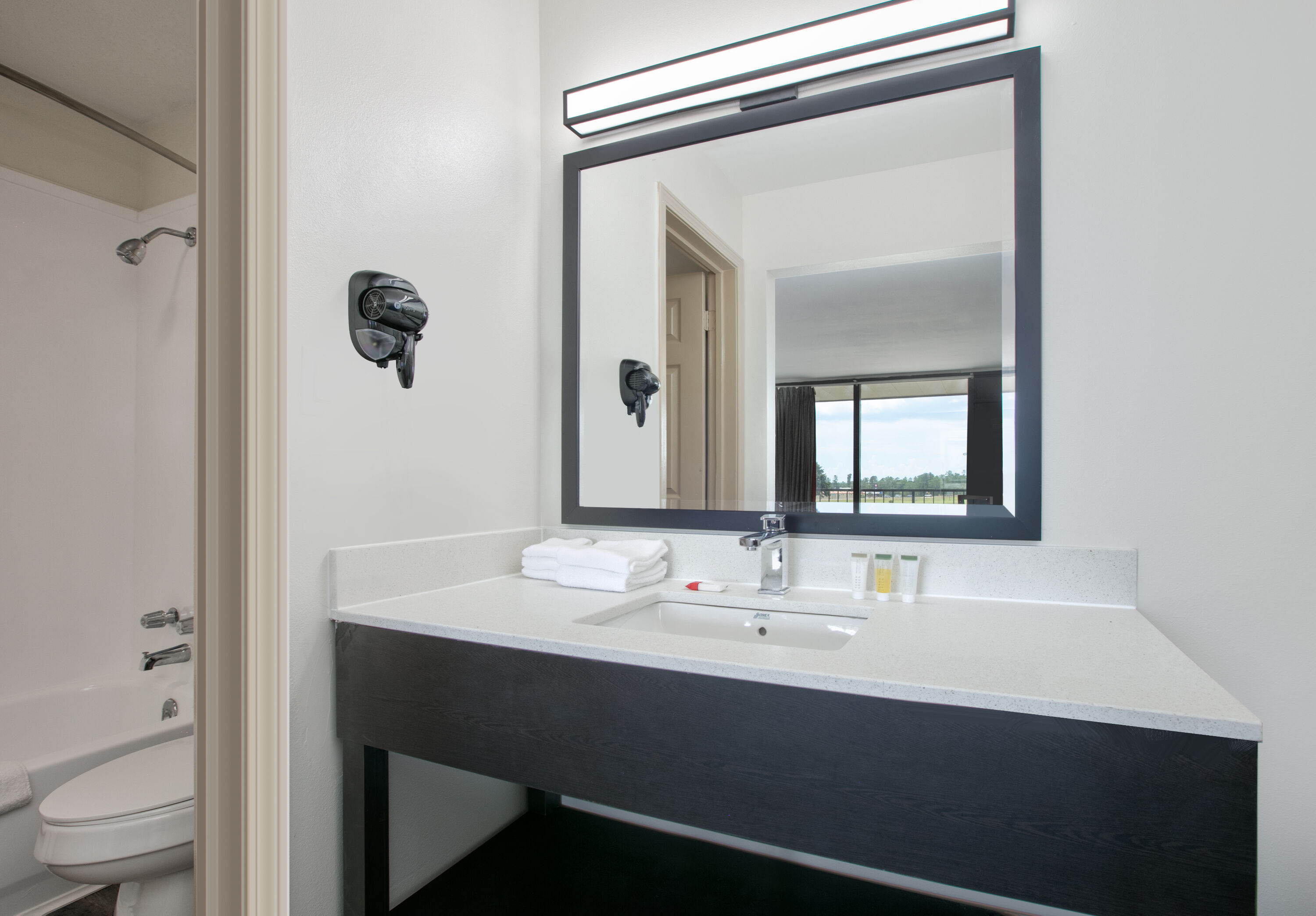 Guest room bath at the Ramada by Wyndham Diamondhead I-10/Gulfport in Diamondhead, Mississippi