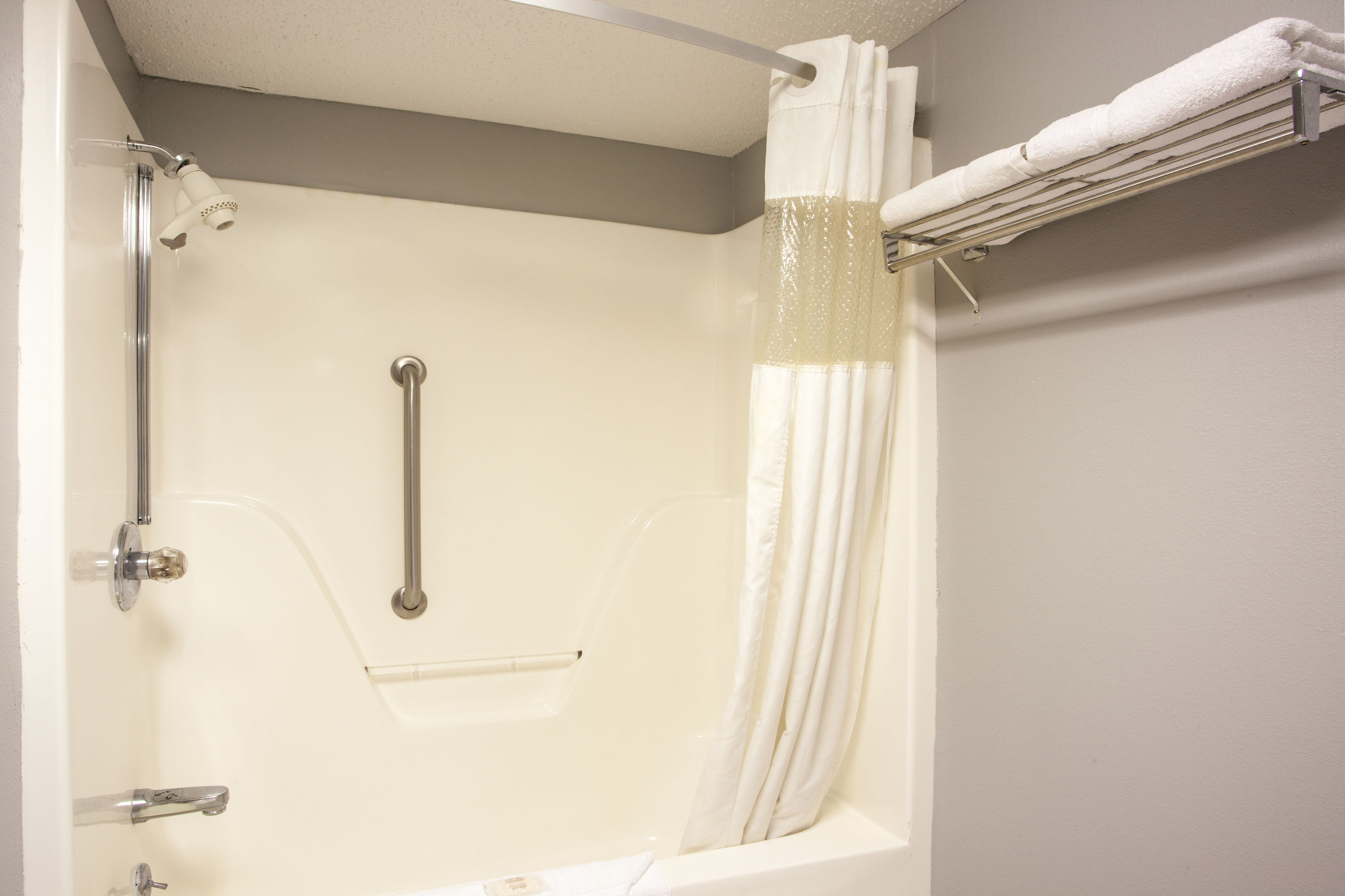 Guest room at the Ramada by Wyndham Pearl/Jackson Airport in Pearl, Mississippi