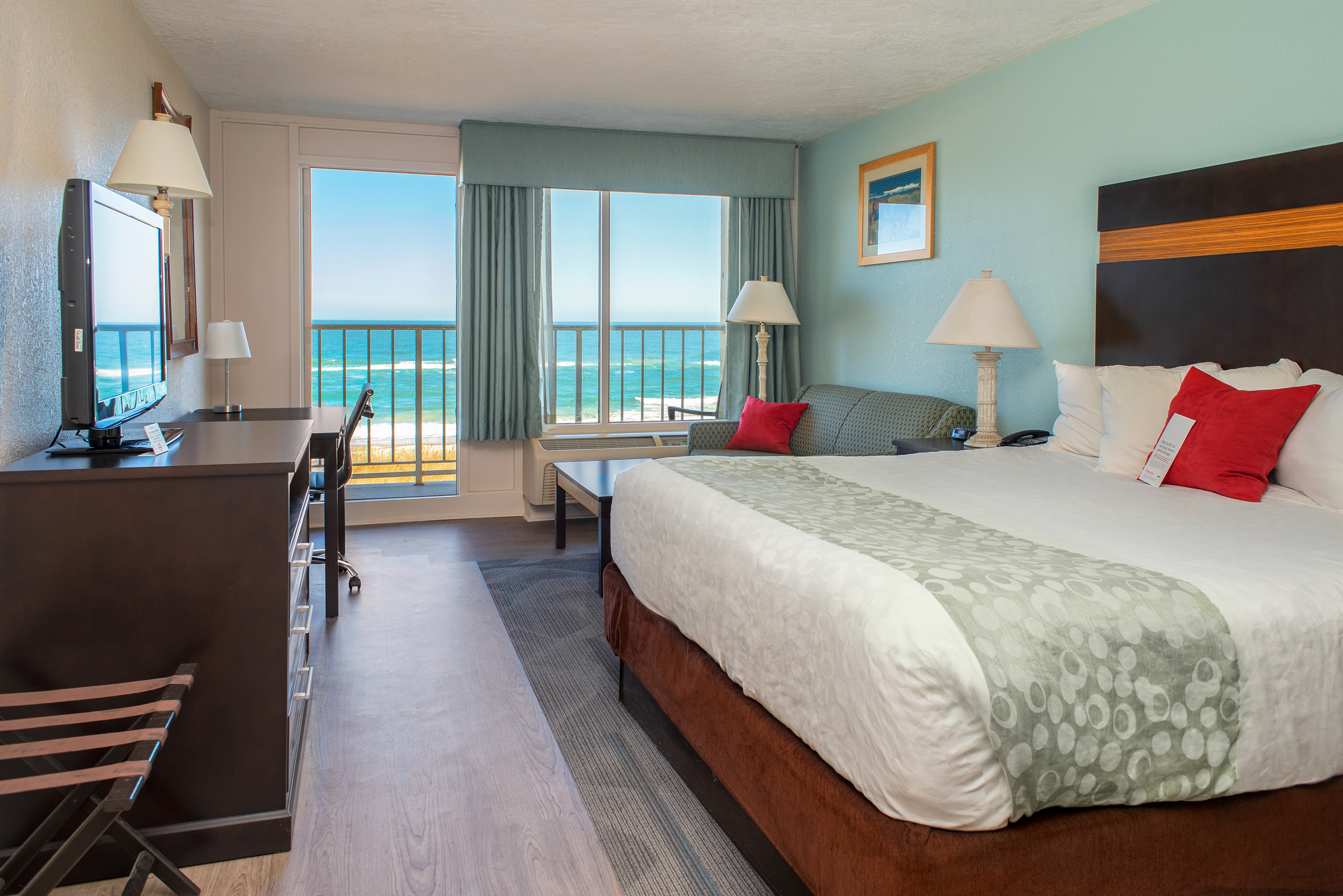 King bed guest room at the Ramada Plaza by Wyndham Nags Head Oceanfront in Kill Devil Hills, North Carolina