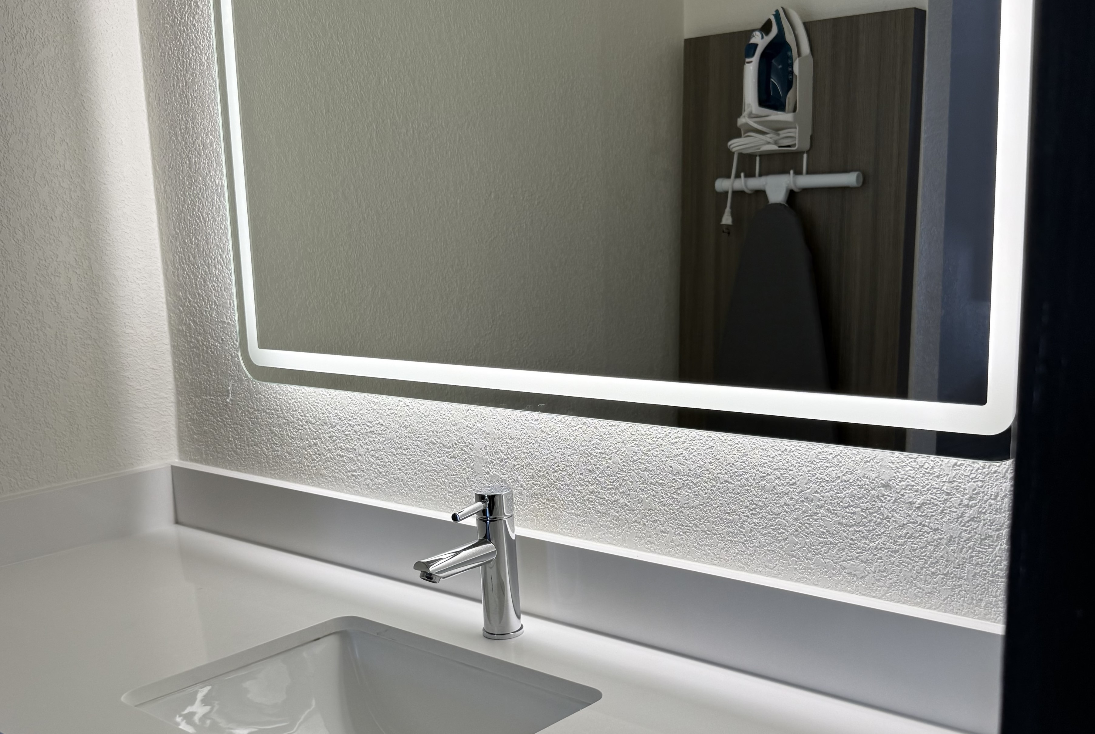 Guest room bath at the Ramada by Wyndham Lumberton NC North in Lumberton, North Carolina