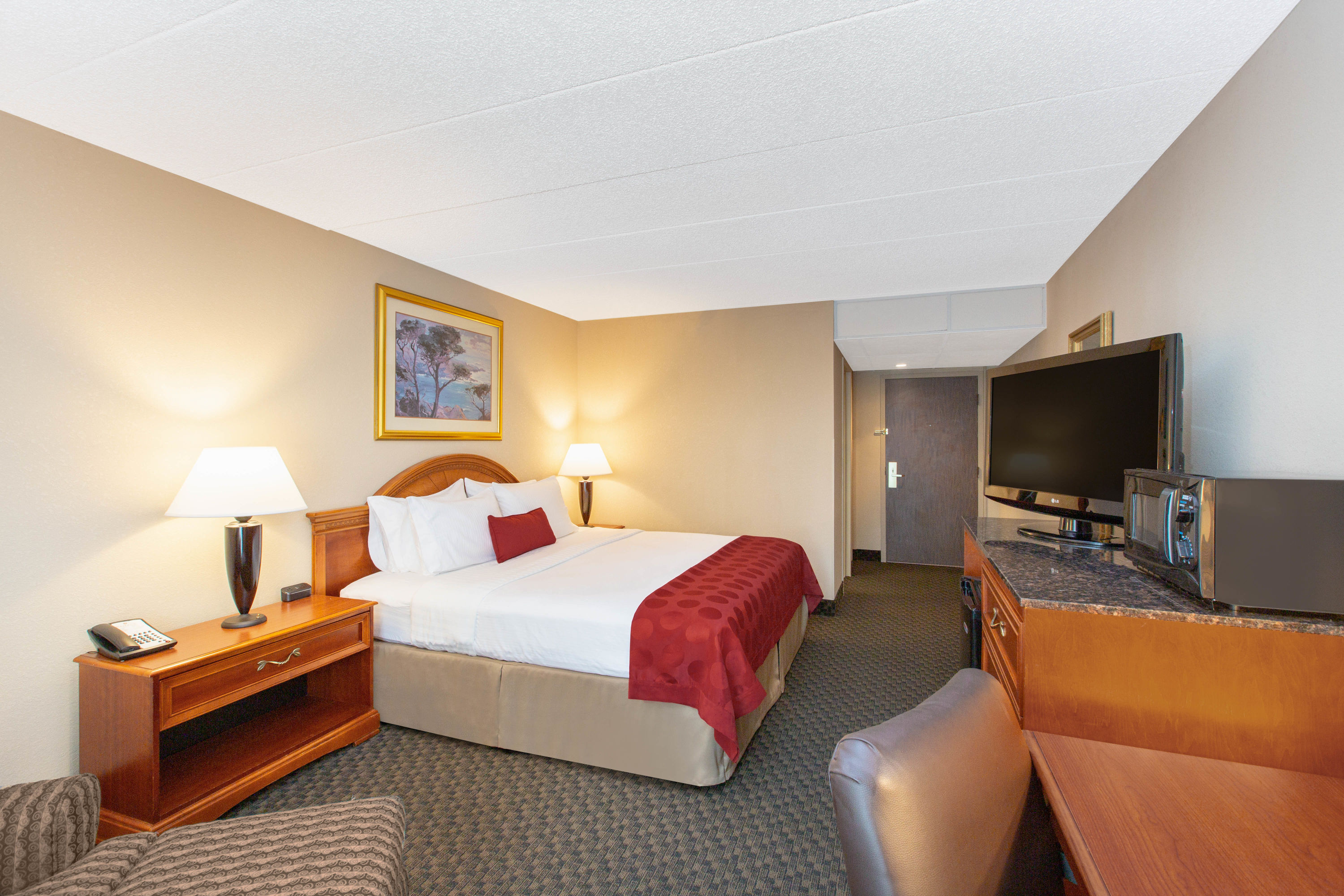 Guest room at the Ramada by Wyndham Midtown Grand Island in Grand Island, Nebraska