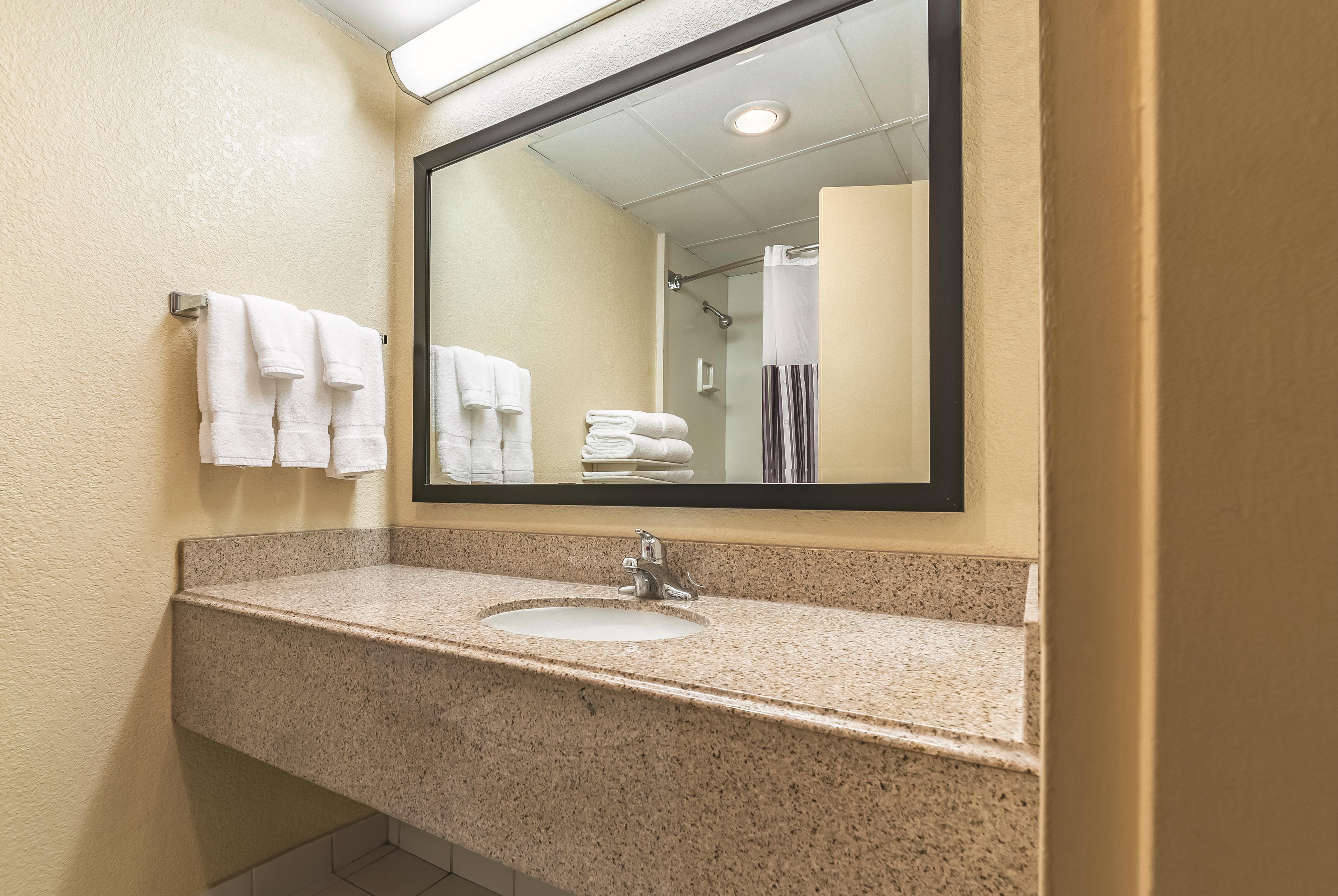 Guest room bath at the Ramada by Wyndham Fairfield NJ in Fairfield, New Jersey