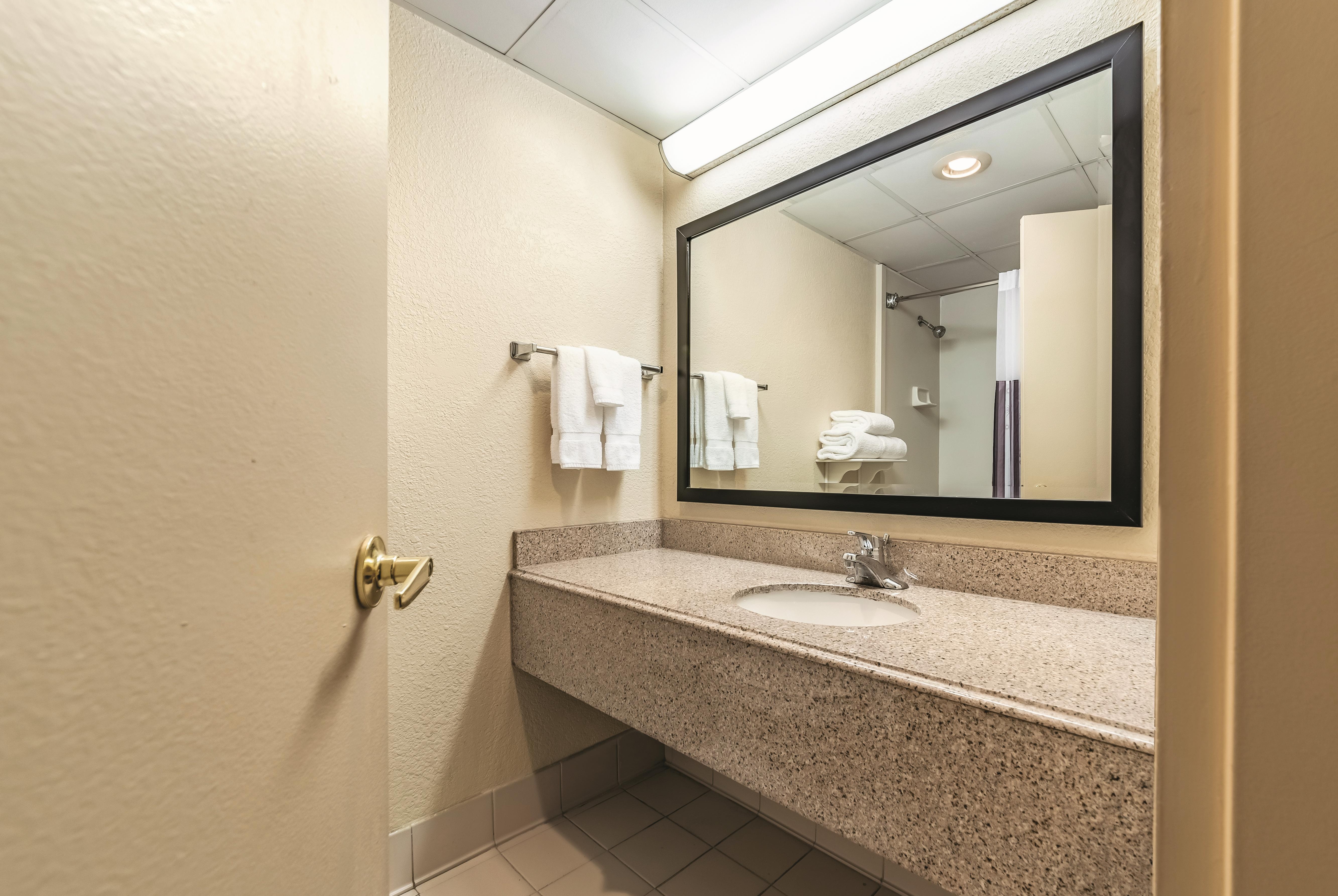 Guest room bath at the Ramada by Wyndham Fairfield NJ in Fairfield, New Jersey