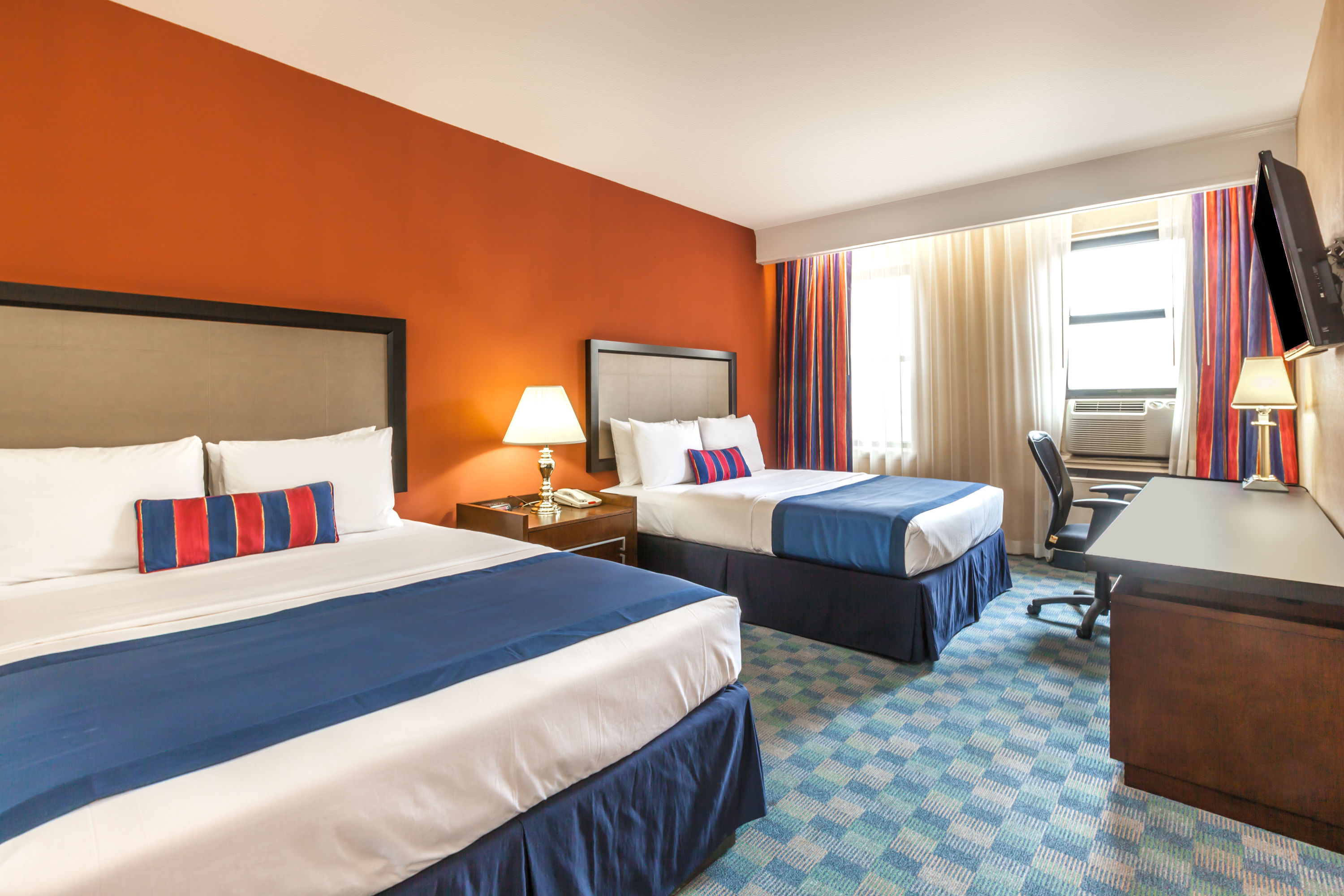 Guest room at the Ramada by Wyndham Jersey City in Jersey City, New Jersey
